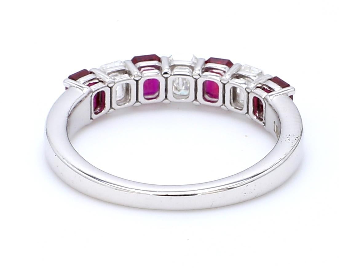 A Beautiful Handcrafted Ring in 18 Karat White Gold with Natural Brilliant Emerald Cut Diamond and No Heat Mozambique Mined Rubies . A perfect Wedding Ring for the Special occasion. 

Natural Diamond Details
Pieces : 3 Pieces
Weight : 0.54 Carat