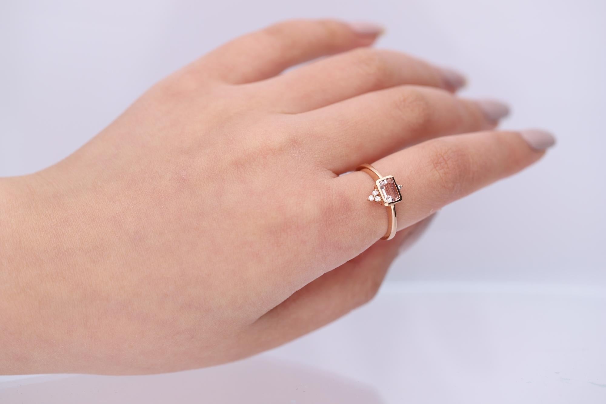 Stunning, timeless and classy eternity Unique Ring. Decorate yourself in luxury with this Gin & Grace Ring. The 14K Rose Gold jewelry boasts with Emerald-cut 1 pcs 0.46 carat Moragnite and Natural Round-cut white Diamond (4 Pcs) 0.04 Carat accent