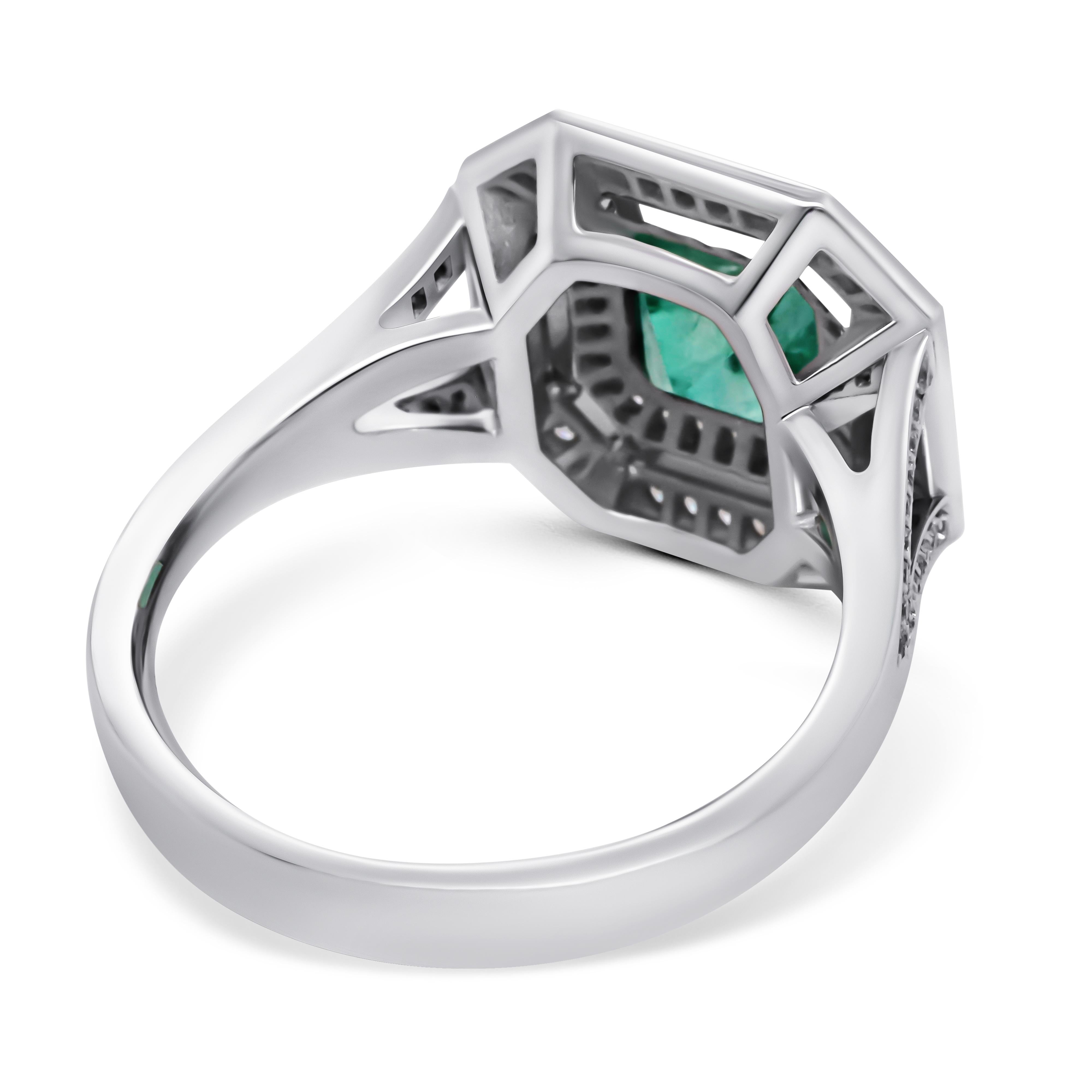 Classic 18k White Gold Ring featuring 0.96 ct Russian Emerald surrounded by White Diamonds totaling 0.35 ctw. 
The traditional yet sophisticated design is truly timeless.

Russia became an important source of emerald in 1830 when it was first