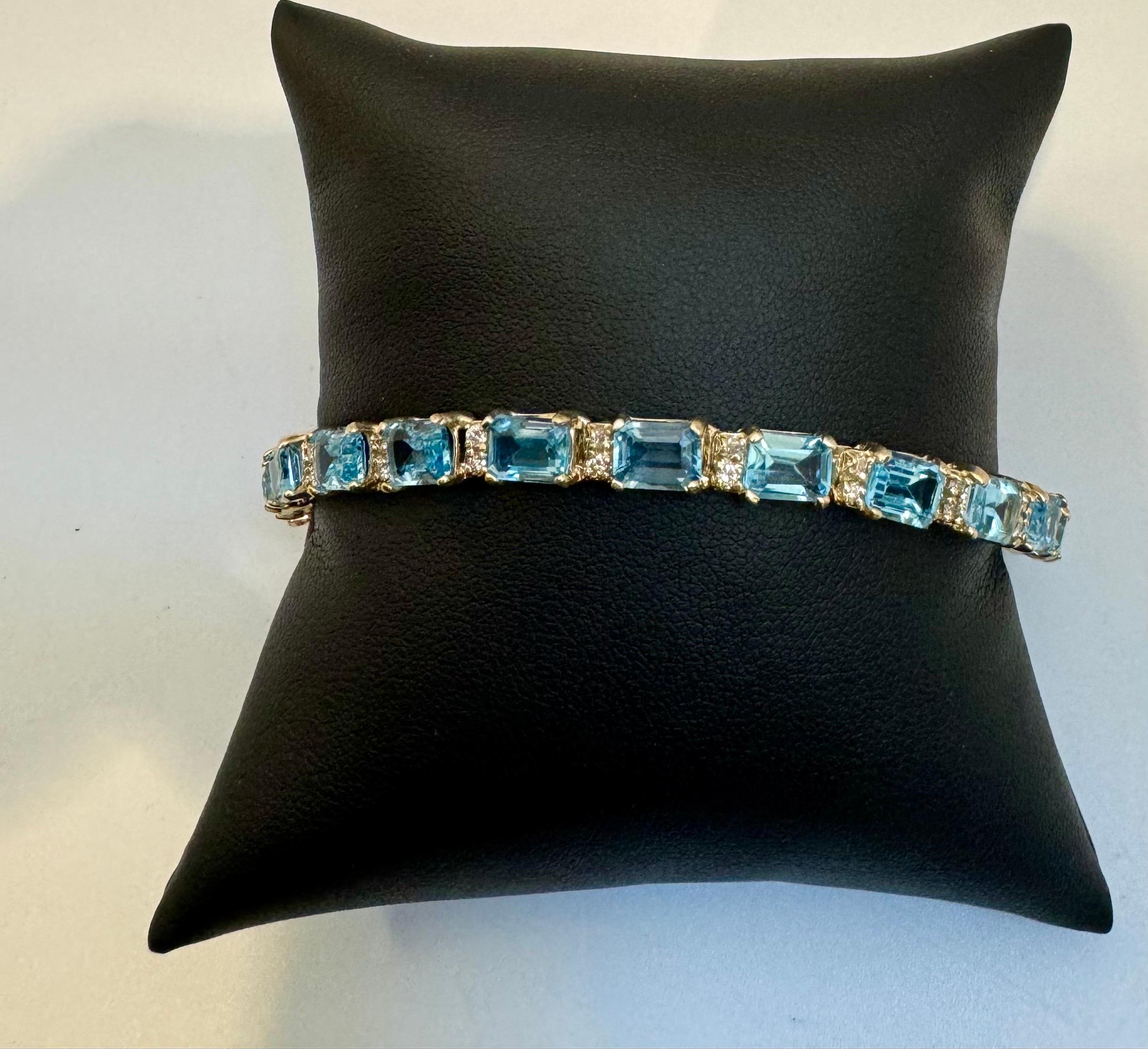  indulge in the allure of our Blue Topaz Bracelet, a testament to refined glamour and timeless style. Meticulously crafted in 14K Yellow Gold, this exquisite piece boasts a mesmerizing 20 cttw Blue Topaz, capturing the essence of the clear blue
