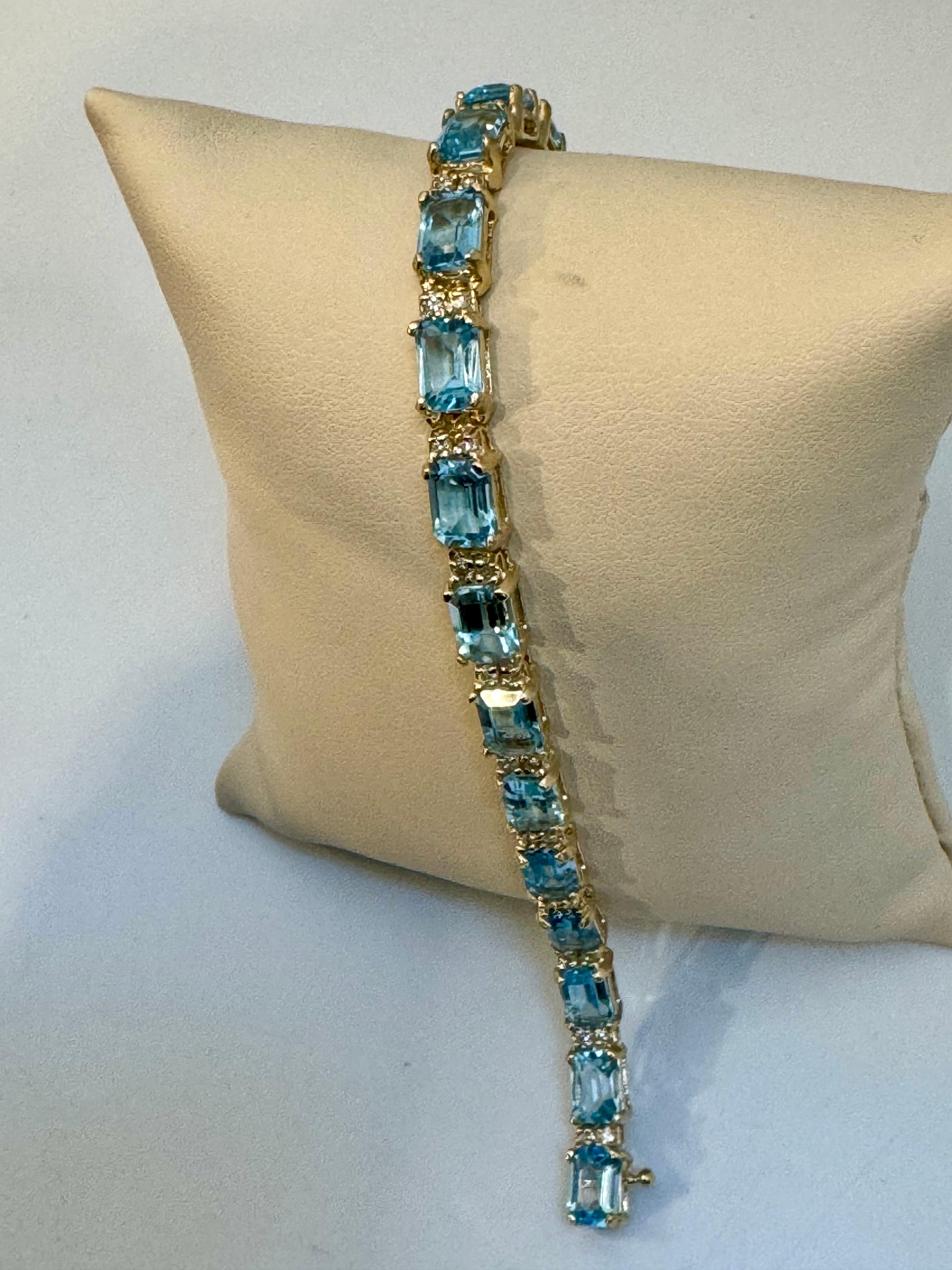 Emerald Cut Classic Emerald-Cut Swiss Blue Topaz Bracelet with Diamonds, 14 Kt Yellow Gold For Sale