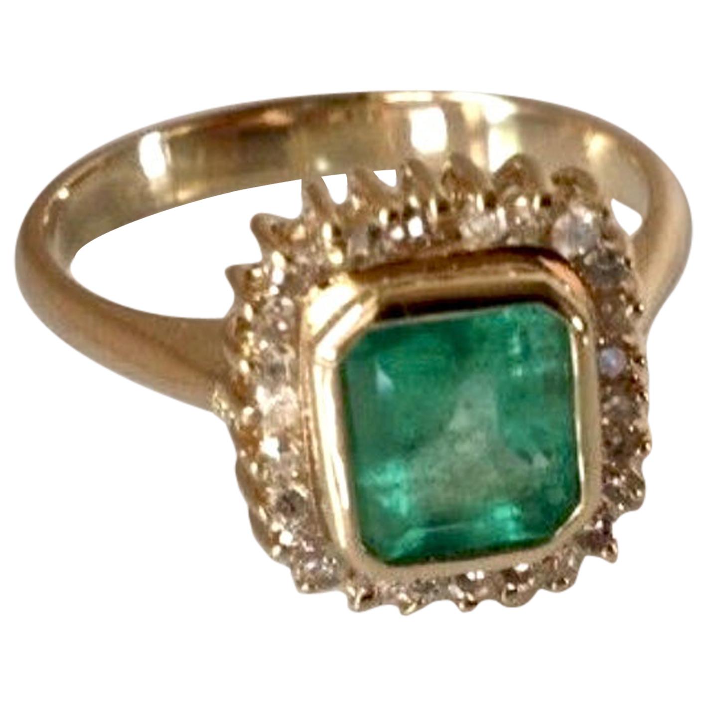 This is a beautiful and classic design 1.75 carat Emerald Diamond engagement Ring
Feature 1 genuine and natural COLOMBIAN emerald, emerald cut 1.50 Carat. The emerald is bezel set Shimmering Medium Green, very good clarity. The Ring is made of solid