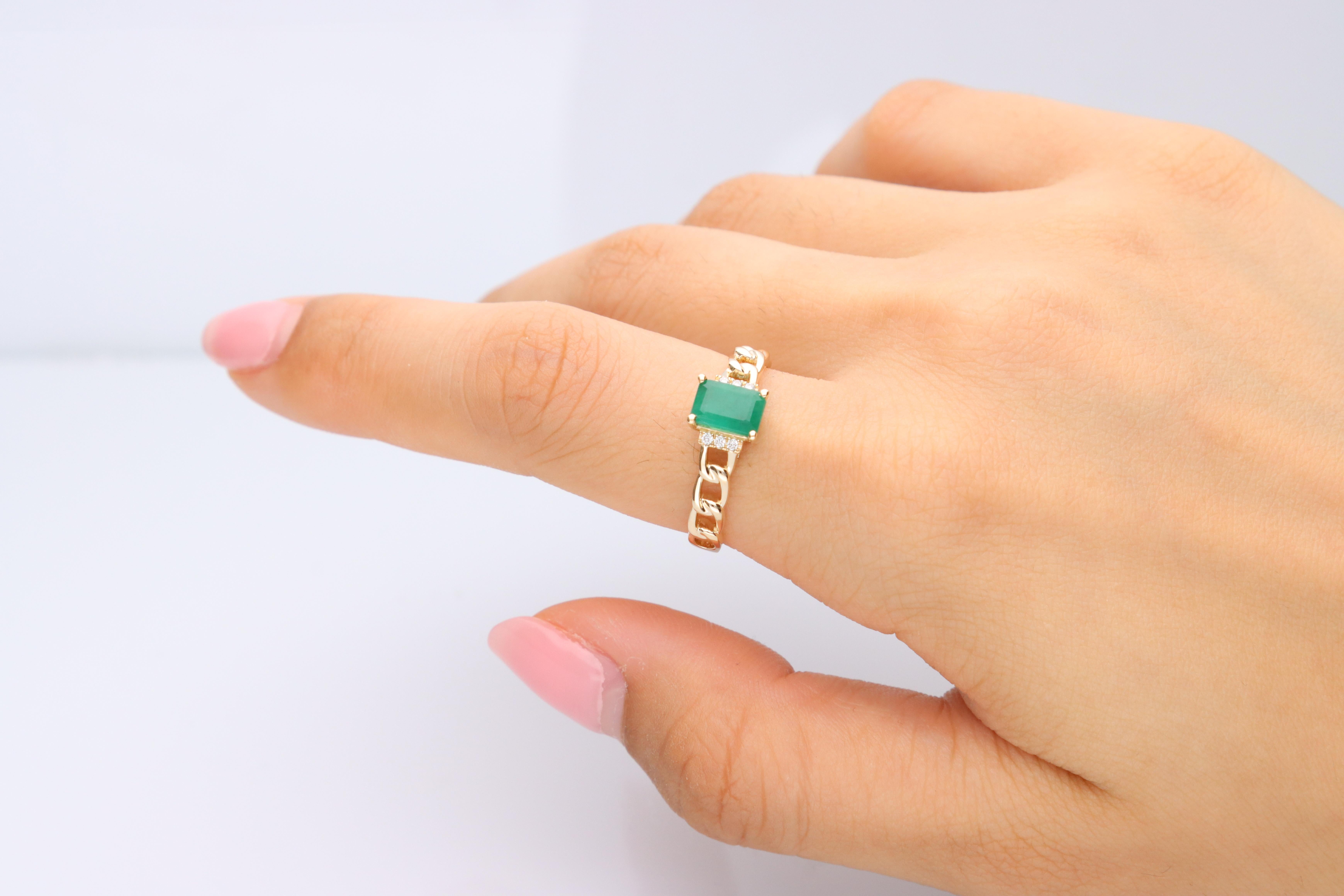 Stunning, timeless and classy eternity Unique Ring. Decorate yourself in luxury with this Gin & Grace Ring. The 14K Yellow Gold jewelry boasts with Emerald-Cut Emerald (1 pcs) 1.01 carat and Natural Round-cut white Diamond (6 Pcs) 0.04 Carat accent