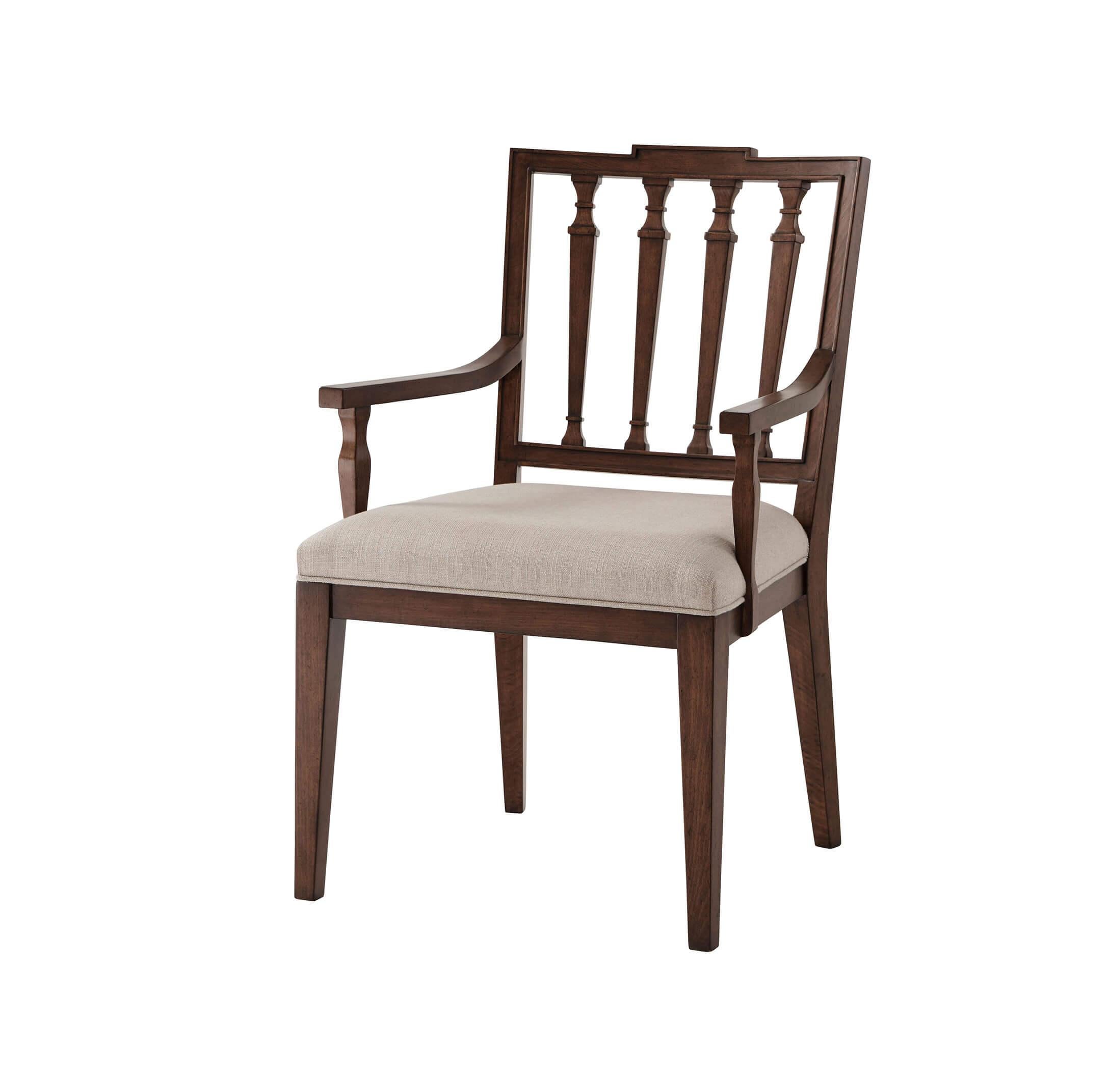 This Classic English dining chairs is hand-carved from beech and have a square crested back with tapered pilaster carved slats with an upholstered seat and raised on square tapering legs. Shown in Draper Linen Fabric.

Contact us for