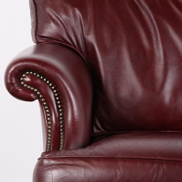 Classic English Rolled Arm Oxblood Leather Two Seat Sofa In Good Condition For Sale In Vancouver, British Columbia