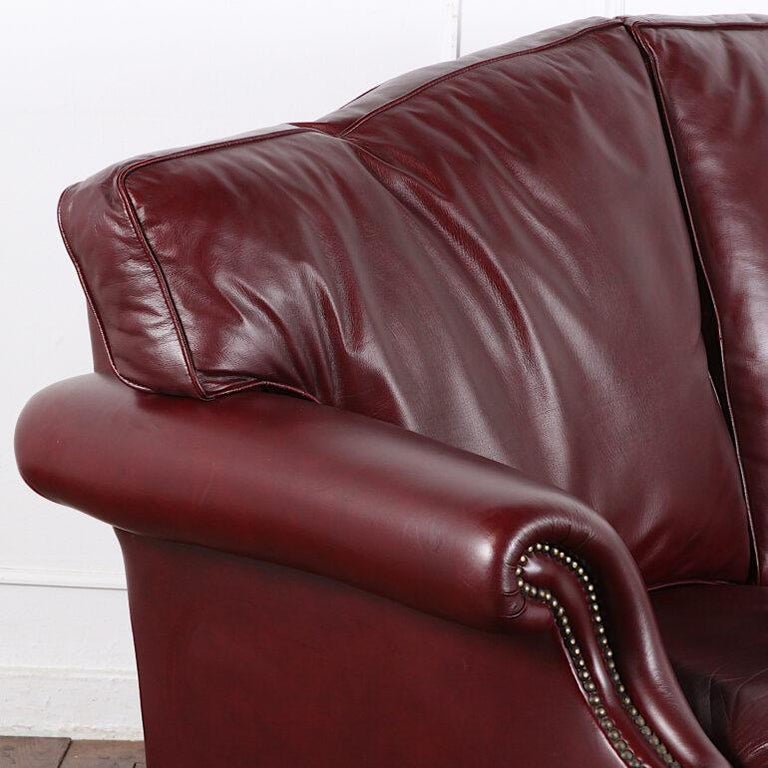 20th Century Classic English Rolled Arm Oxblood Leather Two Seat Sofa For Sale