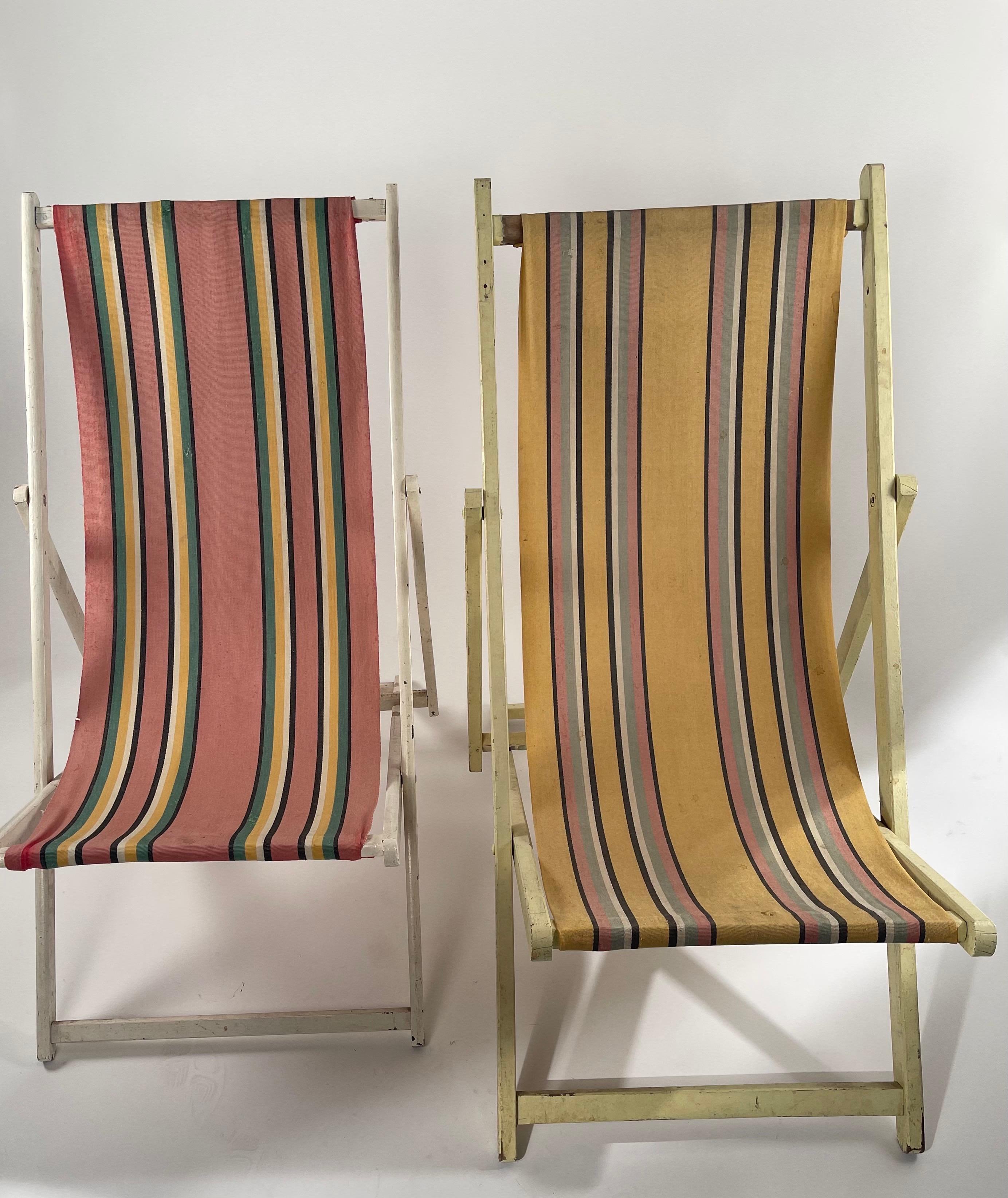 Classic striped canvas foldable chairs. Some staining but have a wonderfully vintage garden look and feel.