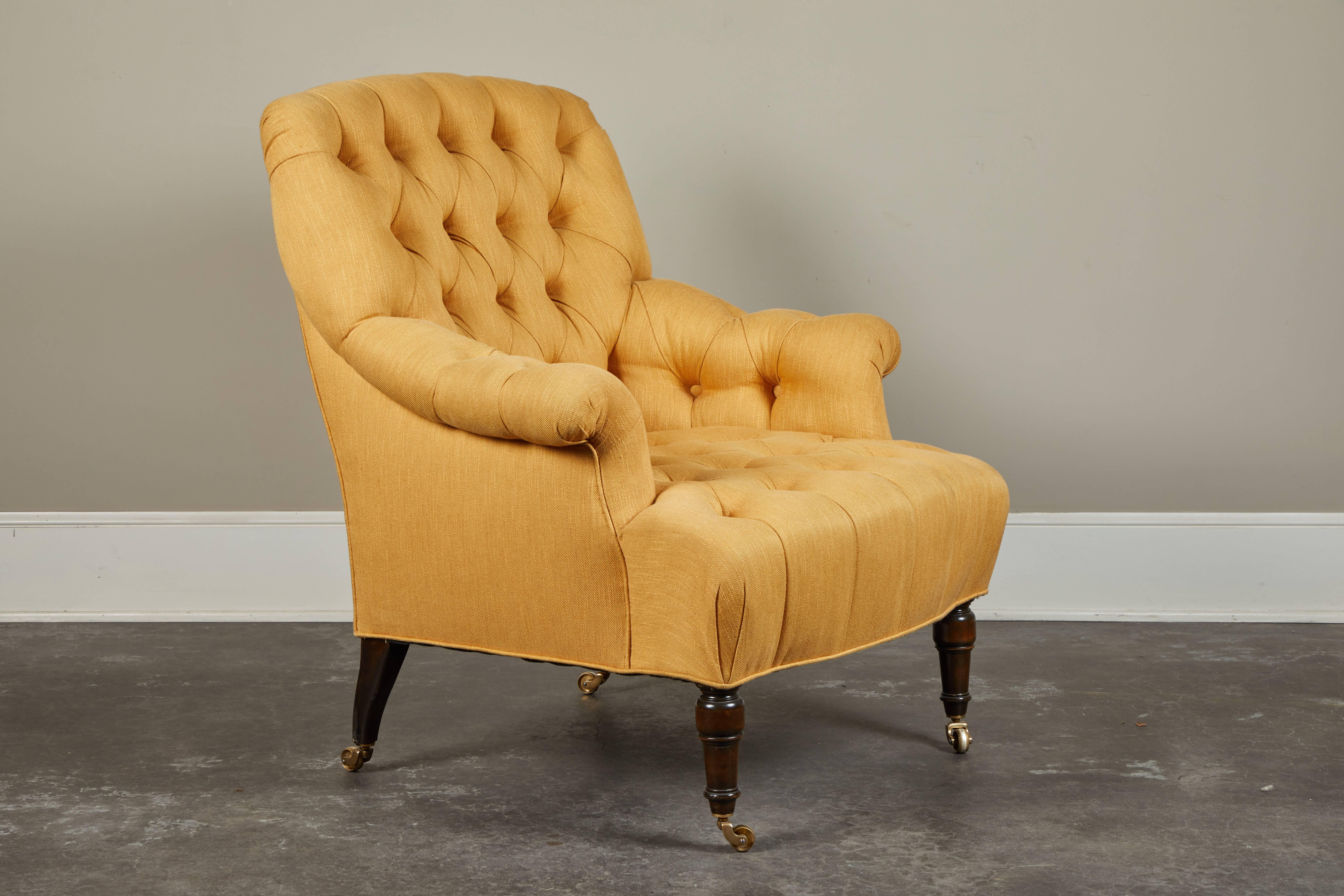 A fully upholstered tufted club chair on castors. Proportions taken from an original antique, reproduced as a mate.  Part of the Susanne Hollis Collection.  6-8 week lead time. 6 yards of fabric needed, priced COM.
