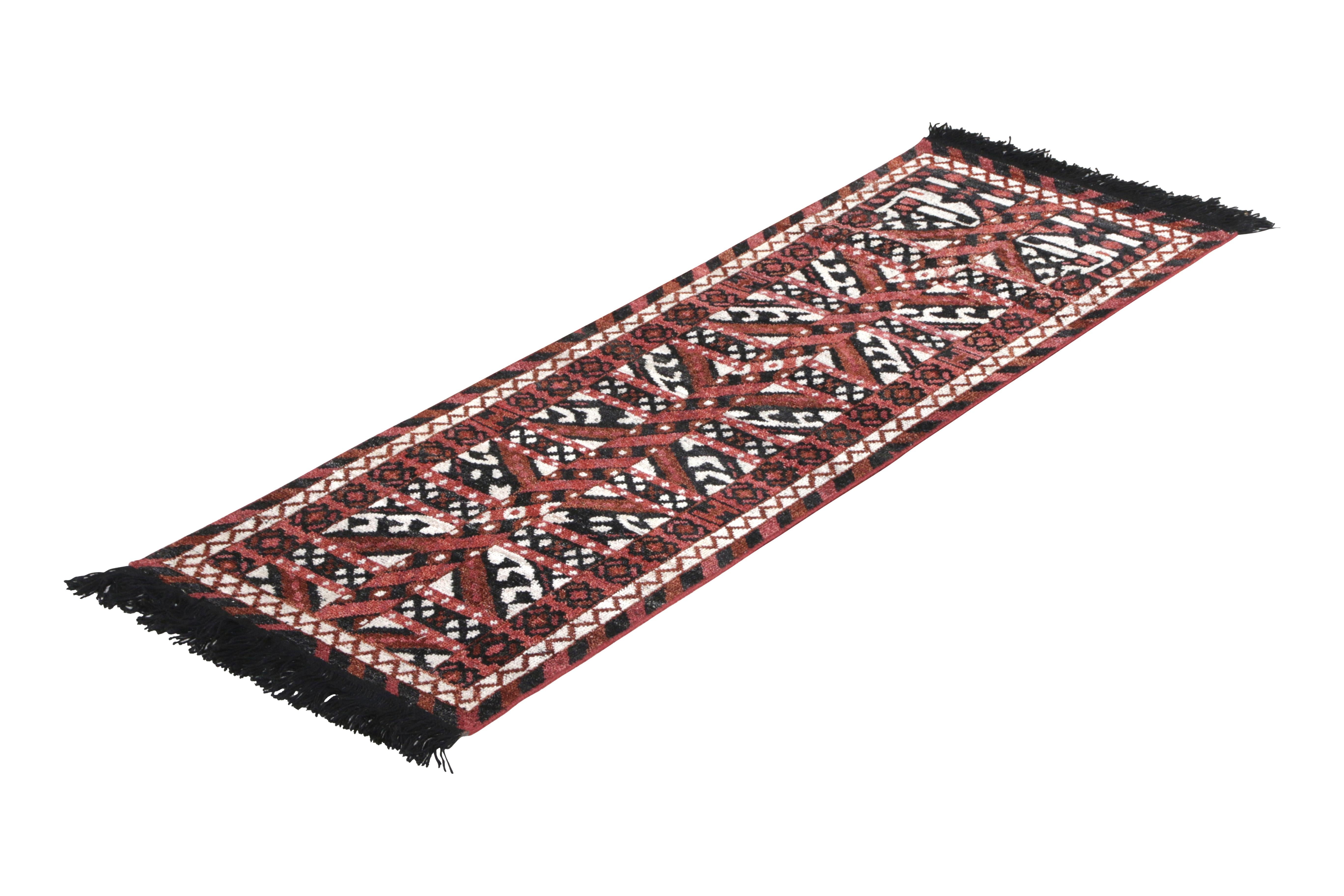 A custom rug design from the Burano Collection by Rug & Kilim, recapturing classic inspirations like that of the Ersari rug style seen in this 2 x 6 runner—particularly desirable for its narrow approach. Hand knotted in notably soft Ghazni wool and