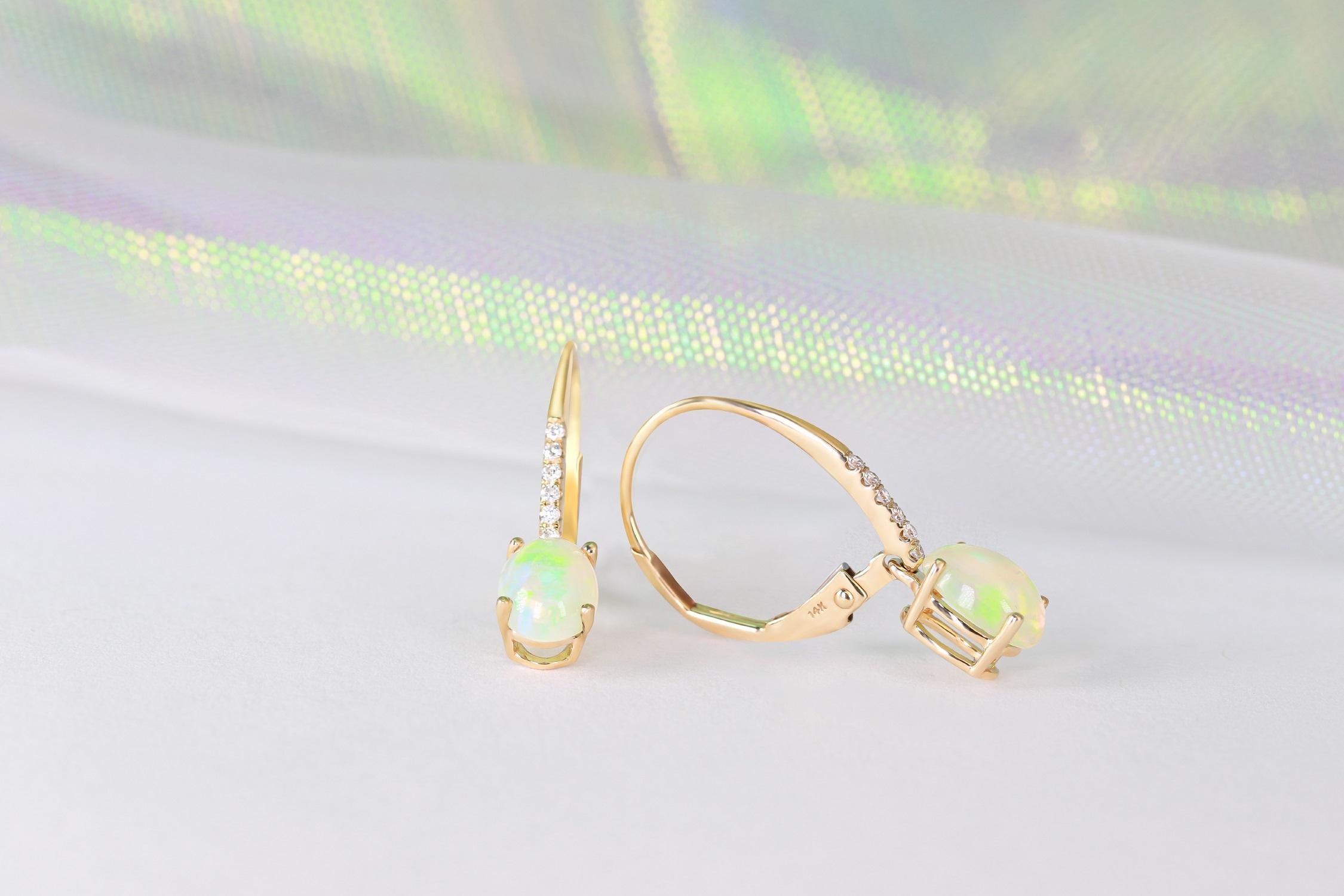 Oval Cut Classic Ethiopian Opal Oval Cab and Diamond 14K Yellow Gold Earring For Sale