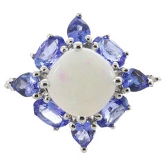 Classico anello da cocktail con opale etiope e tanzanite e diamanti in oro bianco 14k