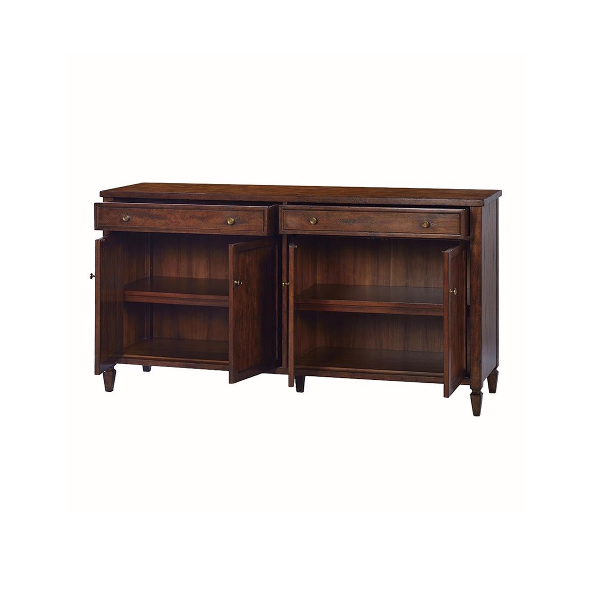 With a warm 'rustic' antiqued brown finish. The sideboard has two wide drawers over two pairs of panel doors, shelves, burnished brass hardware, a smooth top, and a finish with subtle visual distressing.

Dimensions: 64