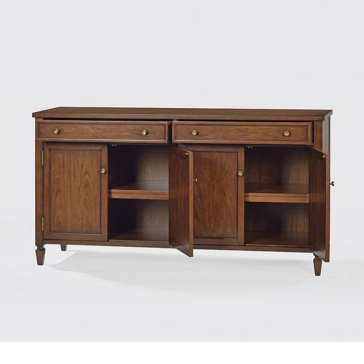 Classic style sideboard with a warm 'rustic' walnut finish. The sideboard has two wide drawers over two pairs of panel doors, shelves, burnished brass hardware, a smooth top, and a finish with subtle visual distressing.

Dimensions: 64