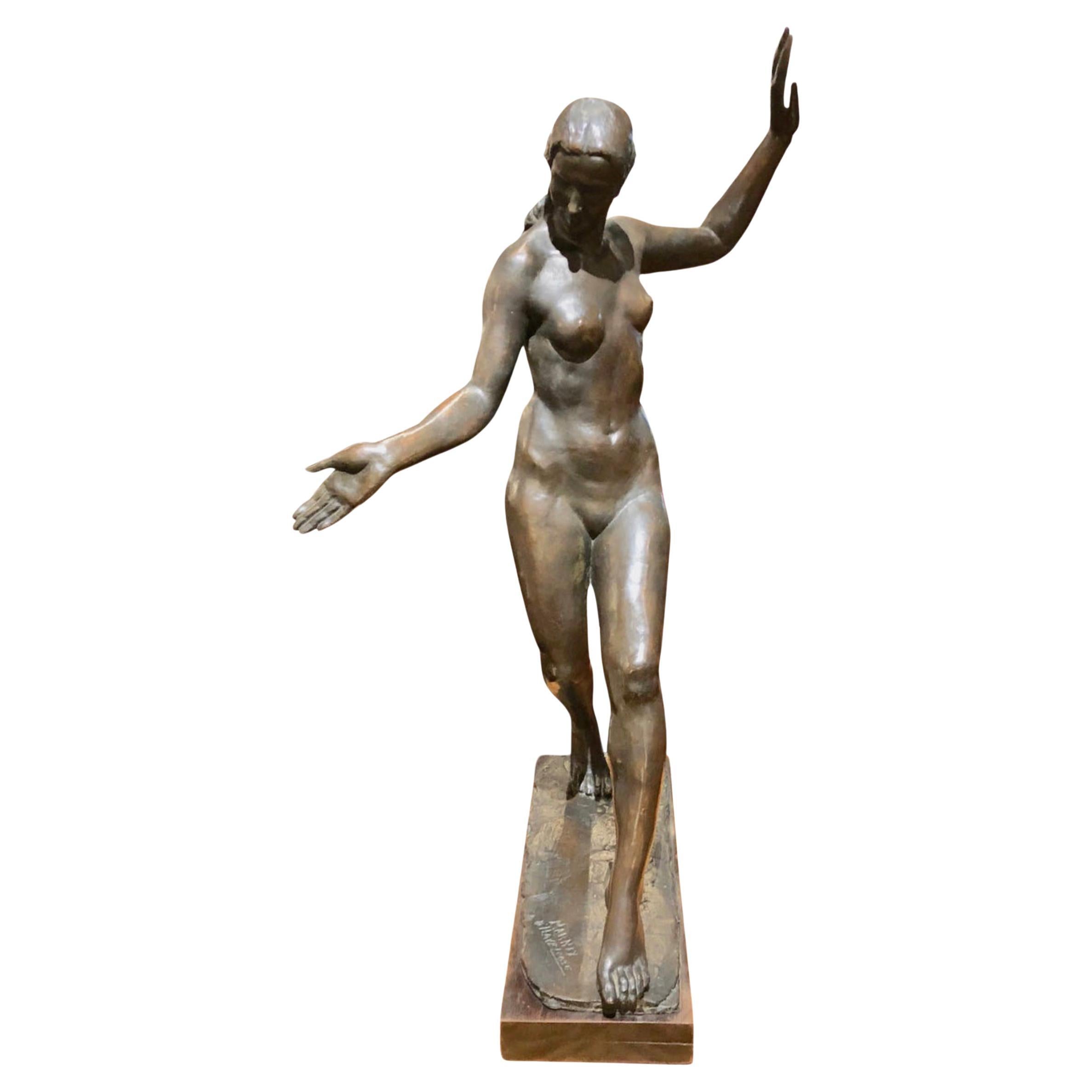 Statue féminine classique en bronze Art déco de l'artiste belge M. D'haveloose, inscrite au catalogue