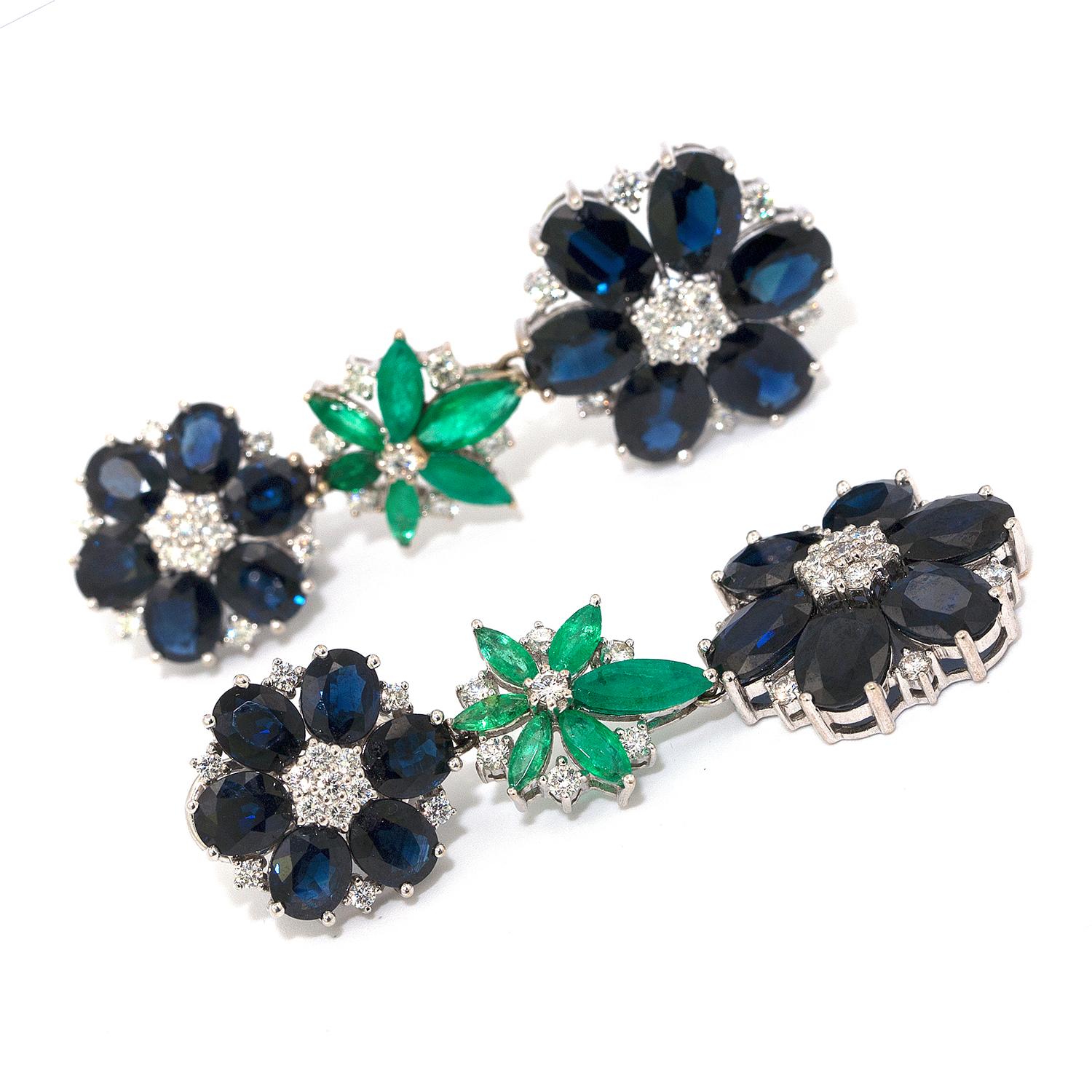 Classic drop, sapphire, emerald and diamond floral design, estate earrings. The 28.79 cts of Australian colored, oval sapphires contrast beautifully with the clean white round brilliant cut diamonds (approx. 1.35cts) that compliment the 3.02 cts of
