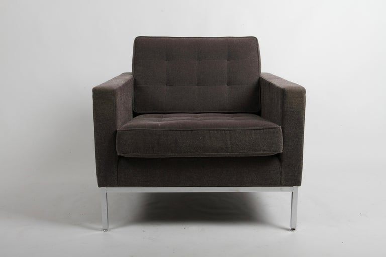 Classic Florence Knoll tufted cloth lounge or club chair, originally designed in 1954, this chair is of recent production. Original Knoll textile upholstery in a purple/grey tone on chrome frame. Stamped Knoll Studio - Florence Knoll to inside of