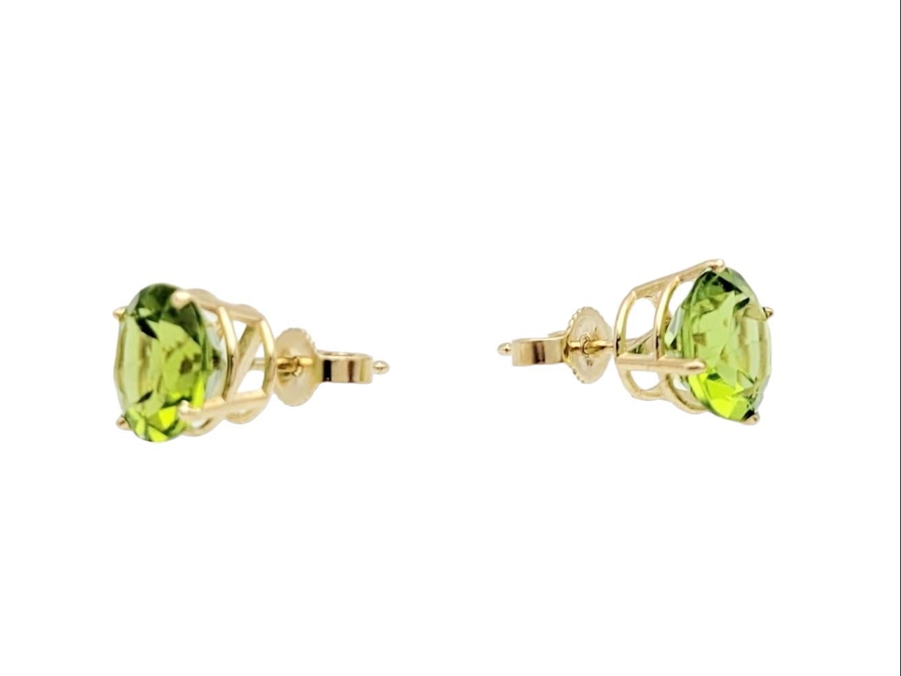 Contemporary Classic Four-Prong Set Round Green Peridot Stud Earrings in 14 Karat Yellow Gold For Sale