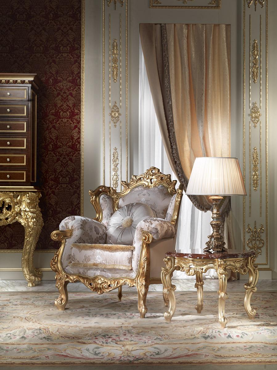 Bringing the 18th century french palace furniture style to your luxururious living space. The grand armchair's rounded embelished arms and legs are intricately hand gilded on the wood. An elegant damask upholstered in taupe tone and dark gold design