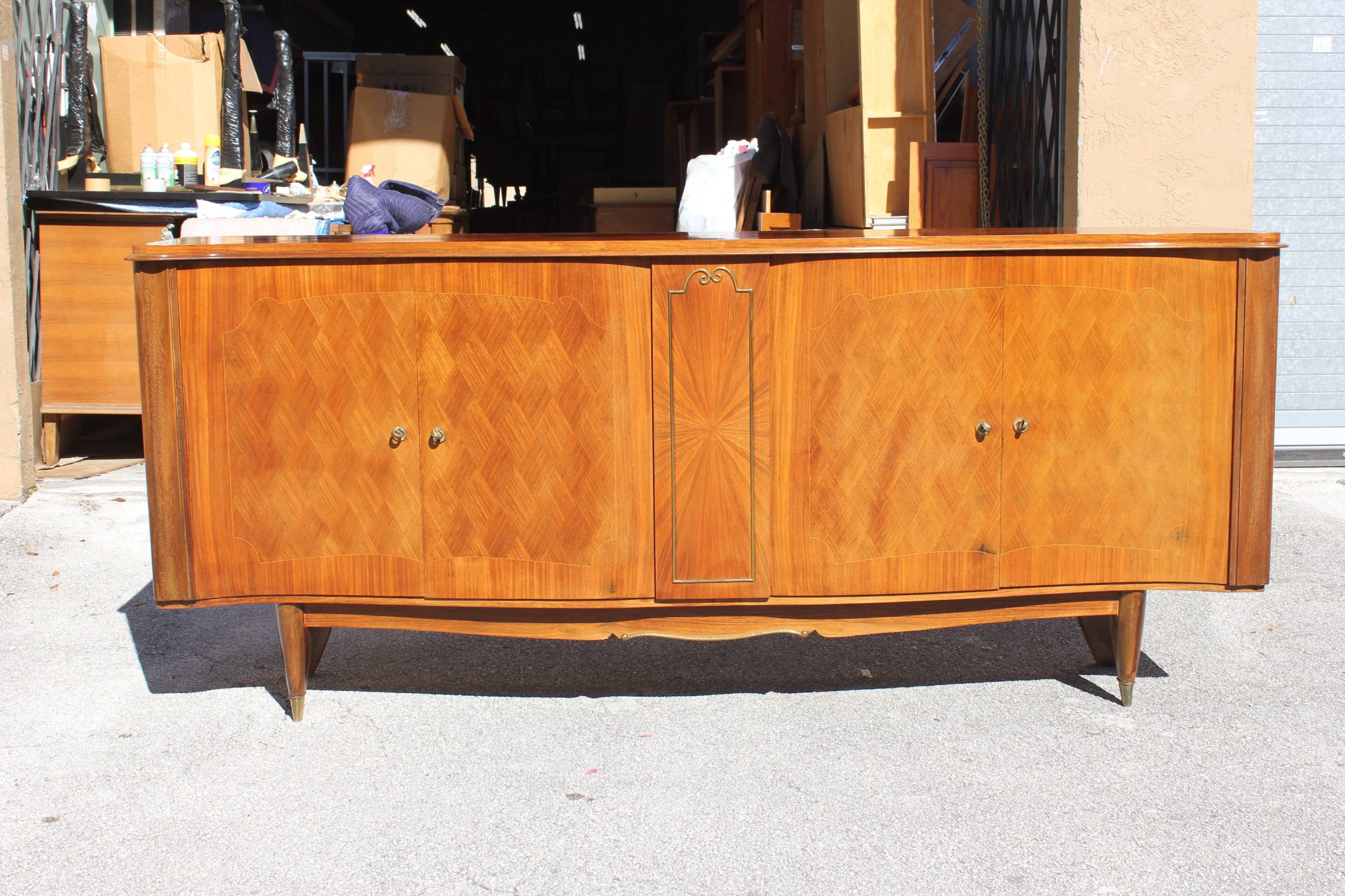 French Art Deco sunburst centre sideboard / buffet rosewood by Jules Leleu, circa 1940s. Very fine craftsmanship and beautiful detail, four doors and two drawers inside with all adjustable shelves, the sideboard are with the original finish you can