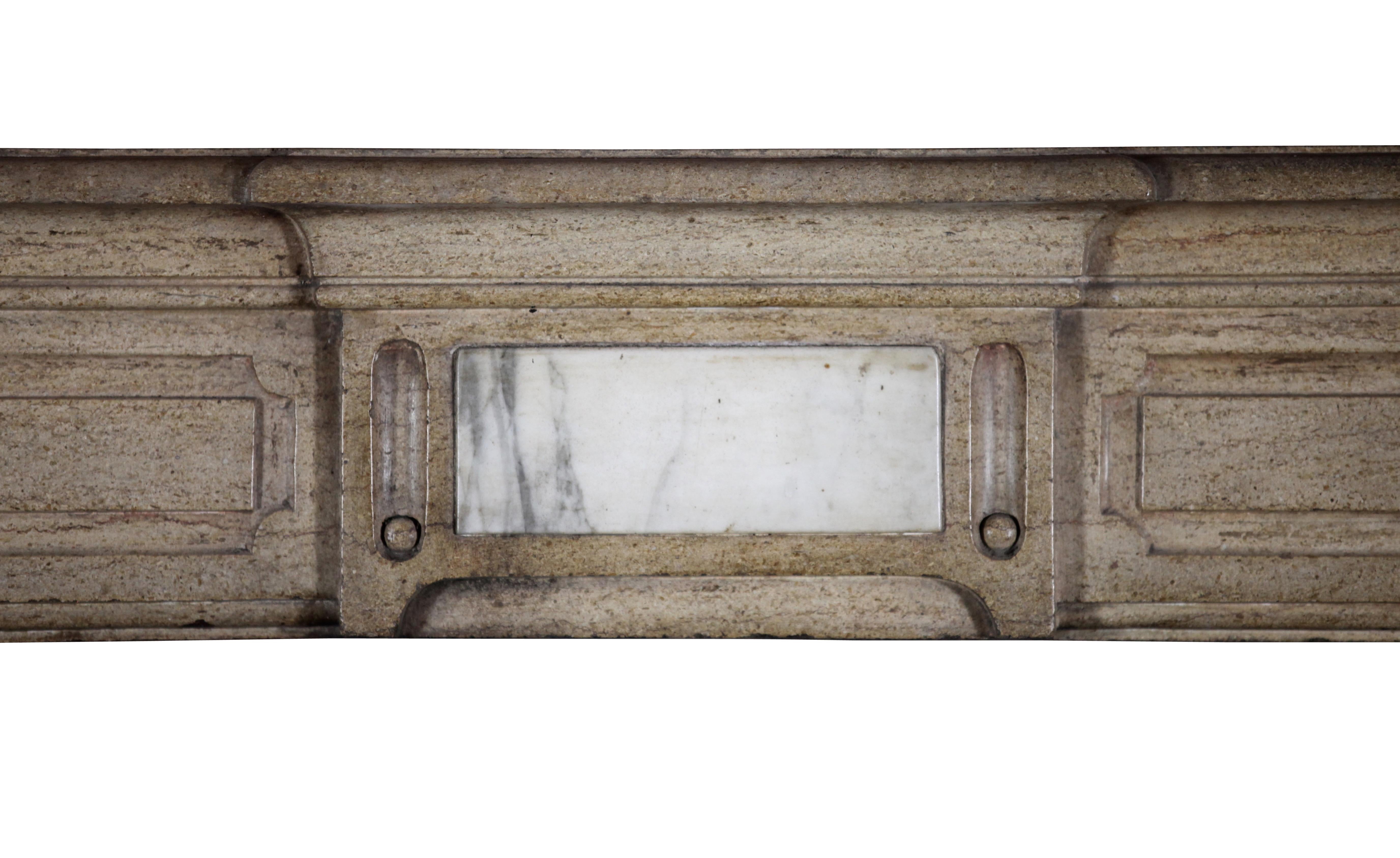 A dine French, burgundy hard stone vintage mantel with marble inlay. It has the typical flower motif on the jambs of the Art Deco period, early 20th century.
Measures:
174 cm exterior width 68.50 inch
111 cm exterior height 43.70 inch
145 cm