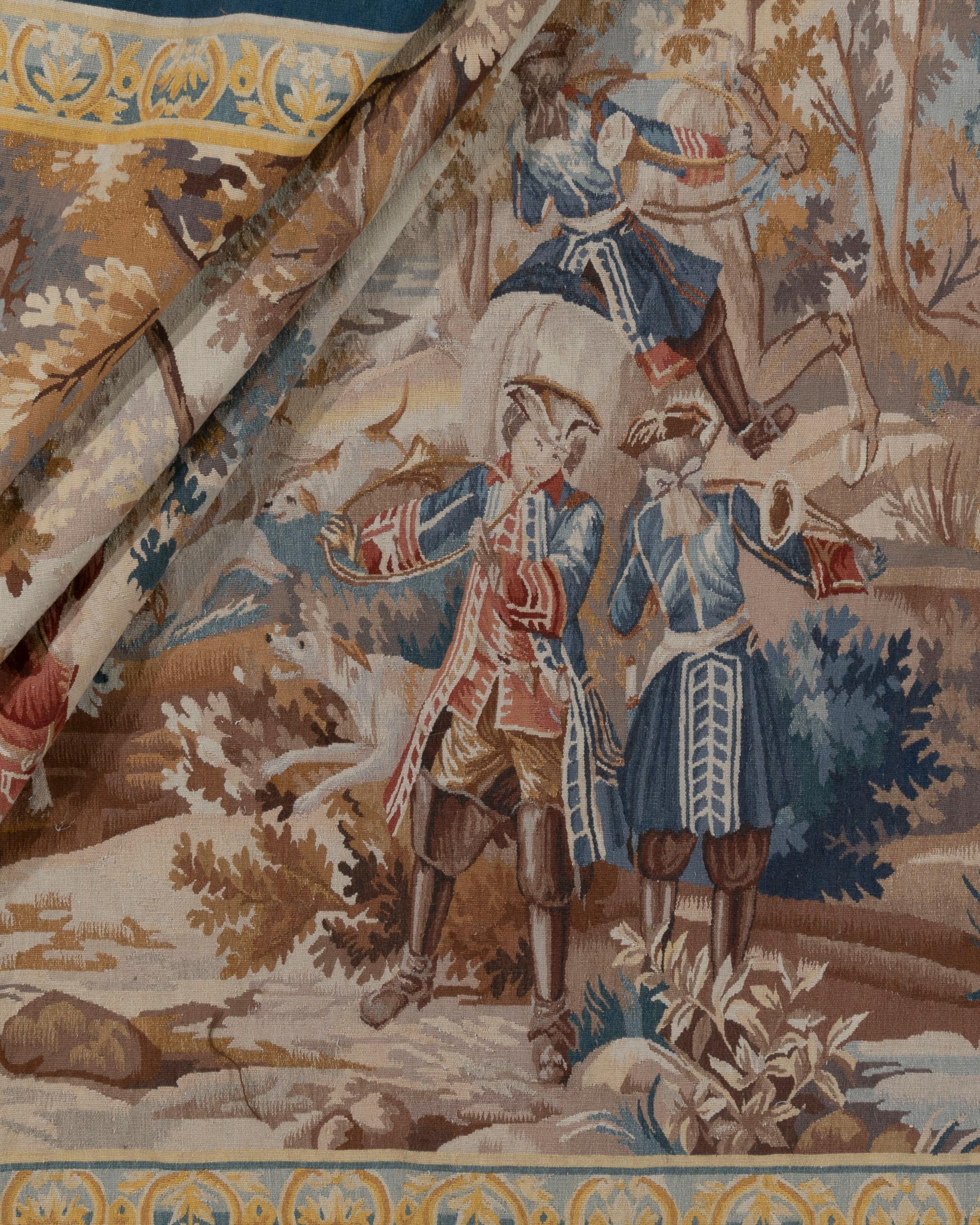 Classic French hunting Scene Tapestry 7'1 x 5'5. A 20th century hand woven reproduction of a classic French hunting scene tapestry.