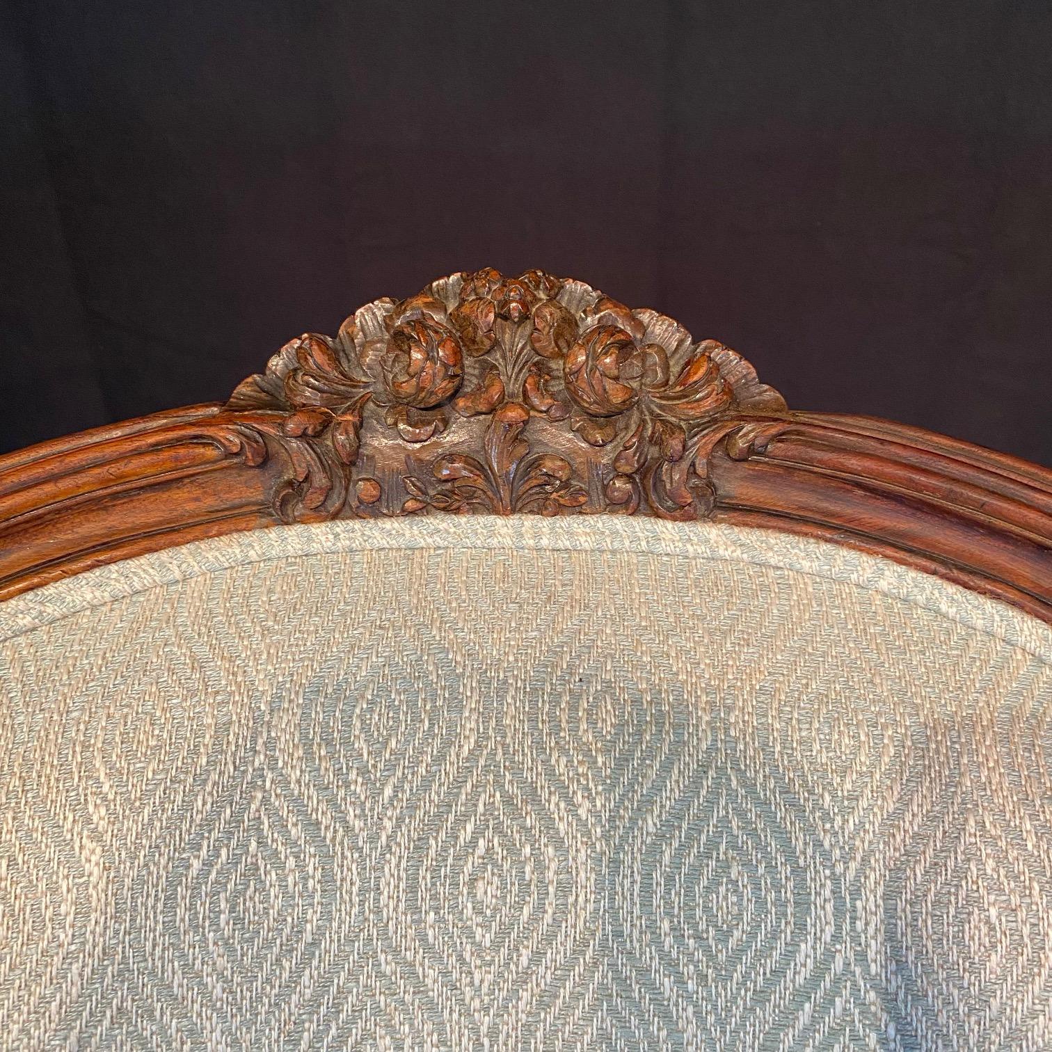 Classic French Louis XV Intricately Carved Walnut Wing Chair For Sale 5