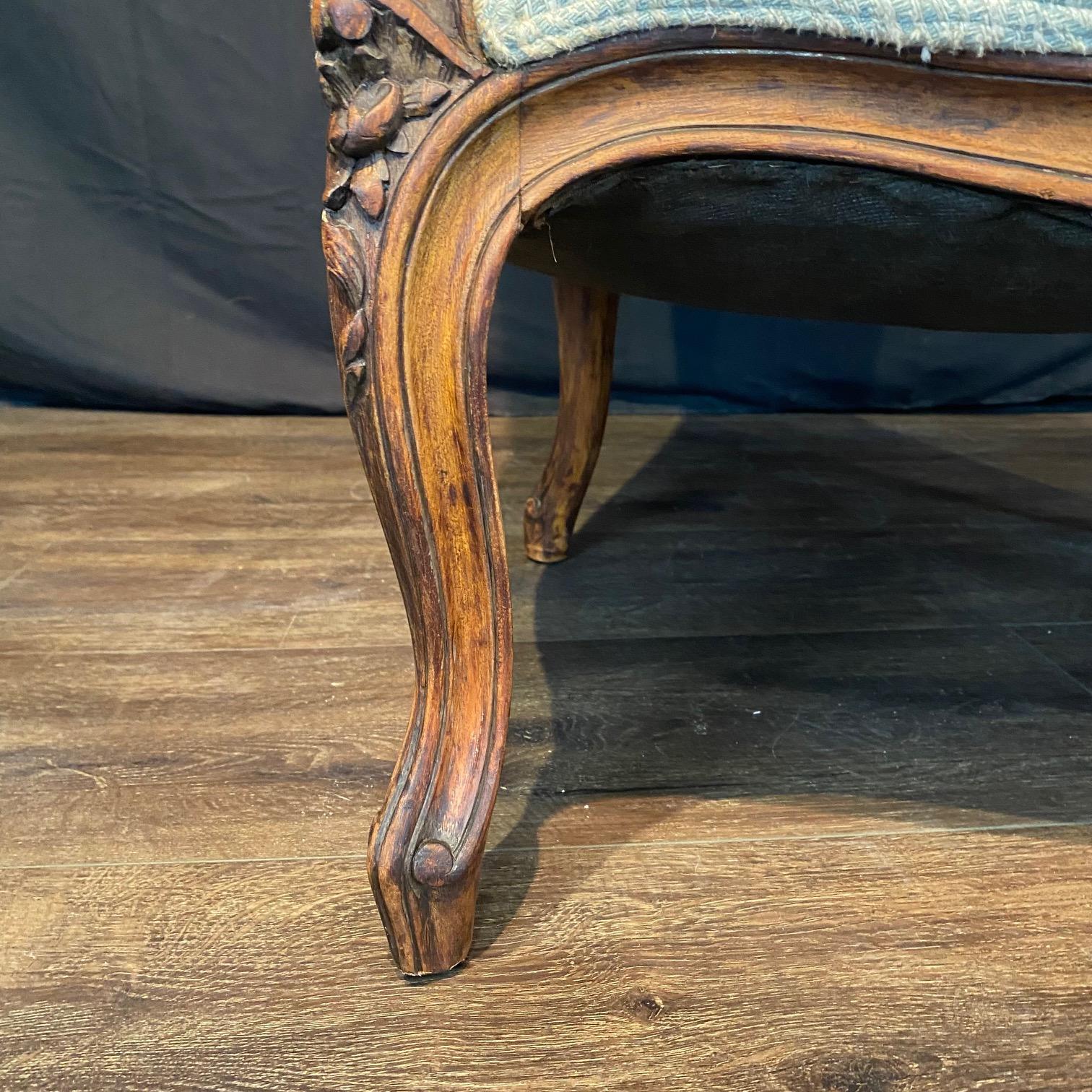 Classic French Louis XV Intricately Carved Walnut Wing Chair For Sale 6