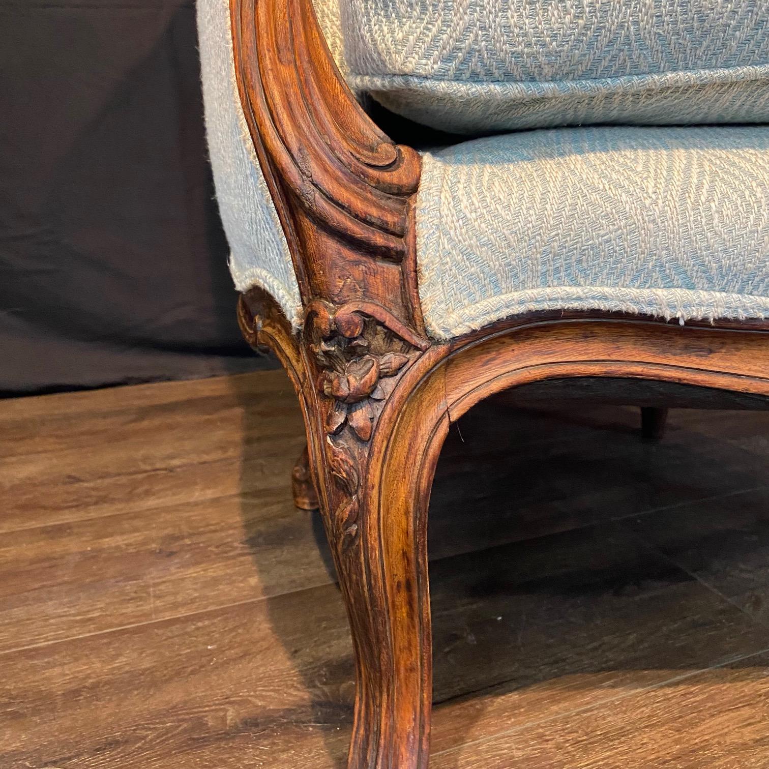 Classic French Louis XV Intricately Carved Walnut Wing Chair For Sale 7