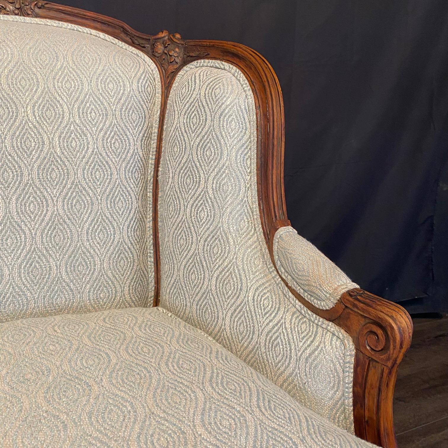 Classic French Louis XV Intricately Carved Walnut Wing Chair In Good Condition For Sale In Hopewell, NJ