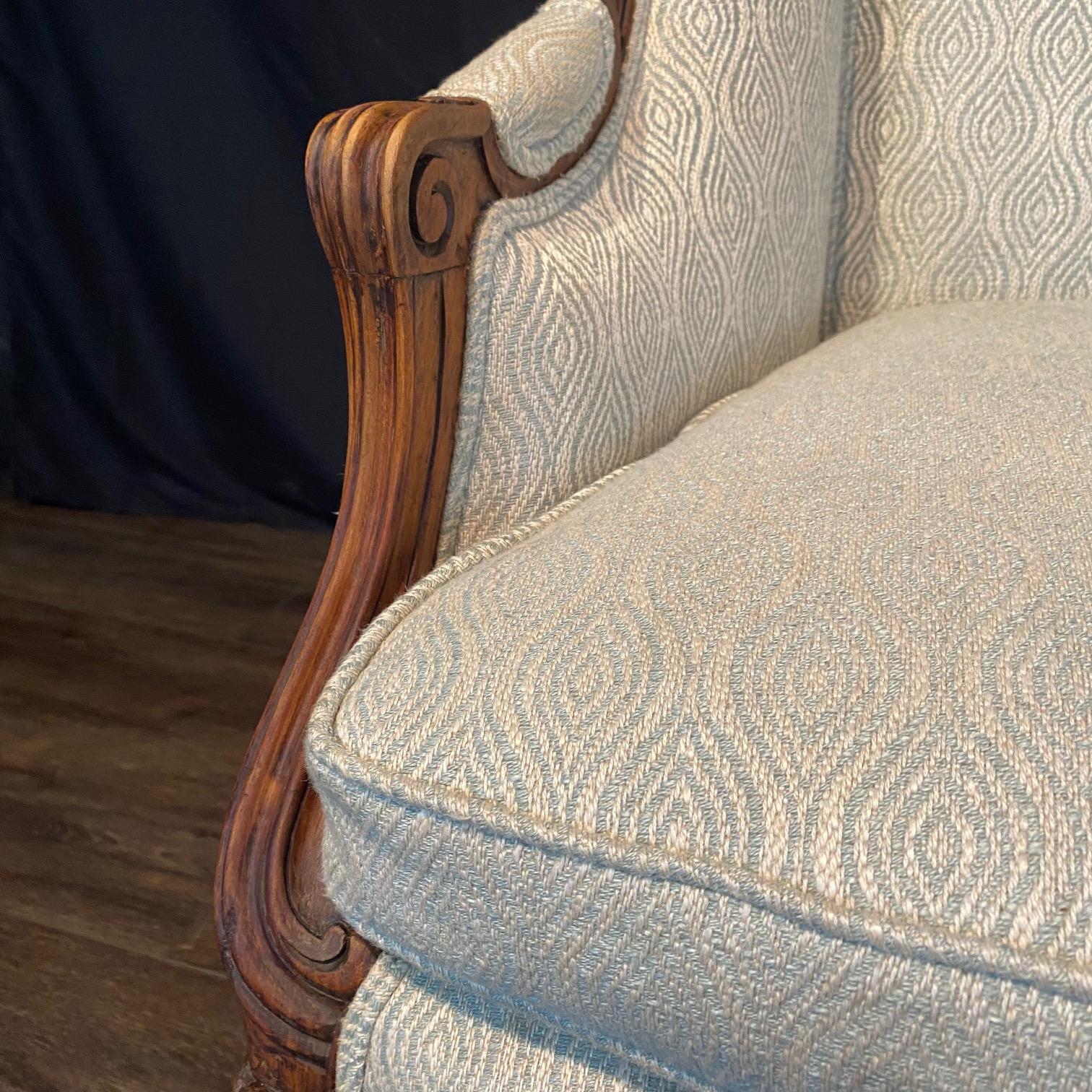 Classic French Louis XV Intricately Carved Walnut Wing Chair For Sale 1