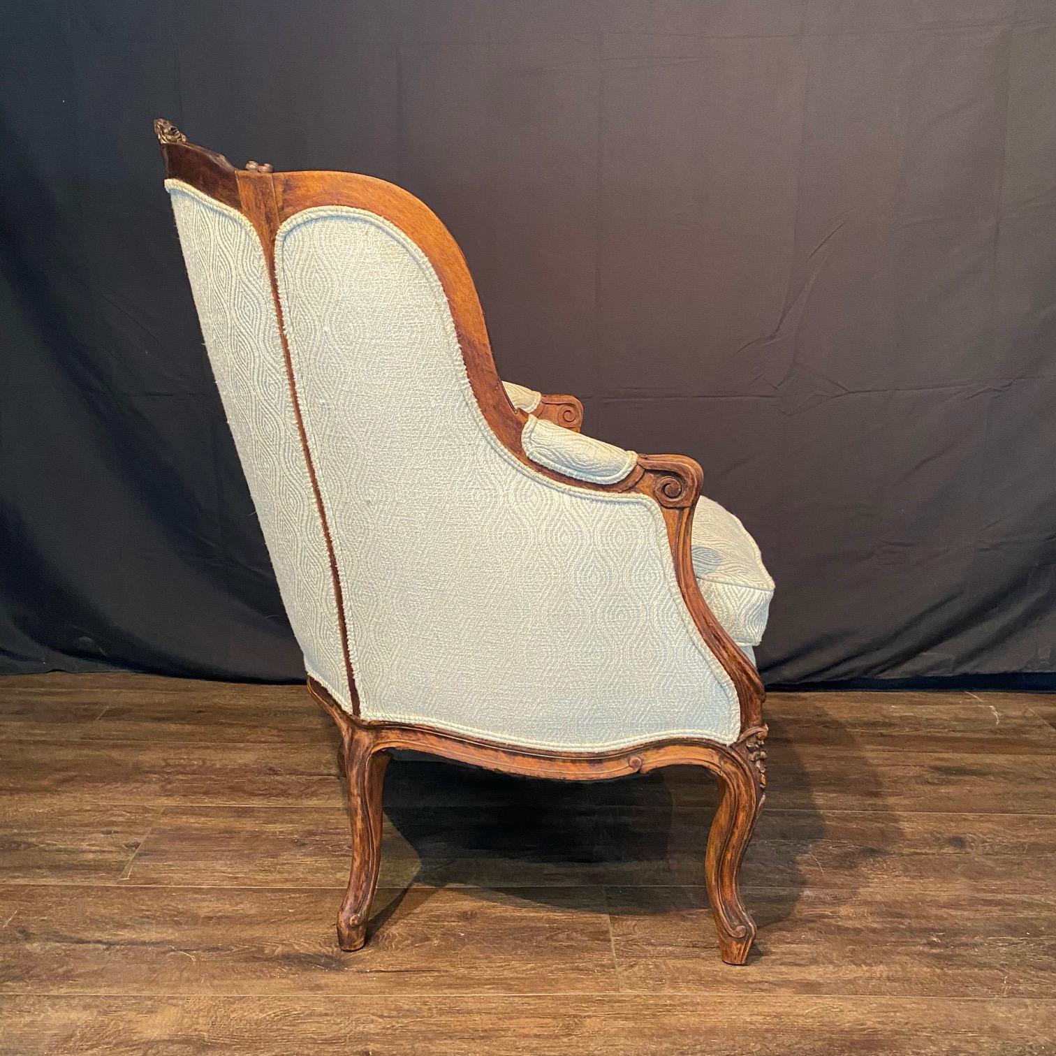 Classic French Louis XV Intricately Carved Walnut Wing Chair For Sale 4