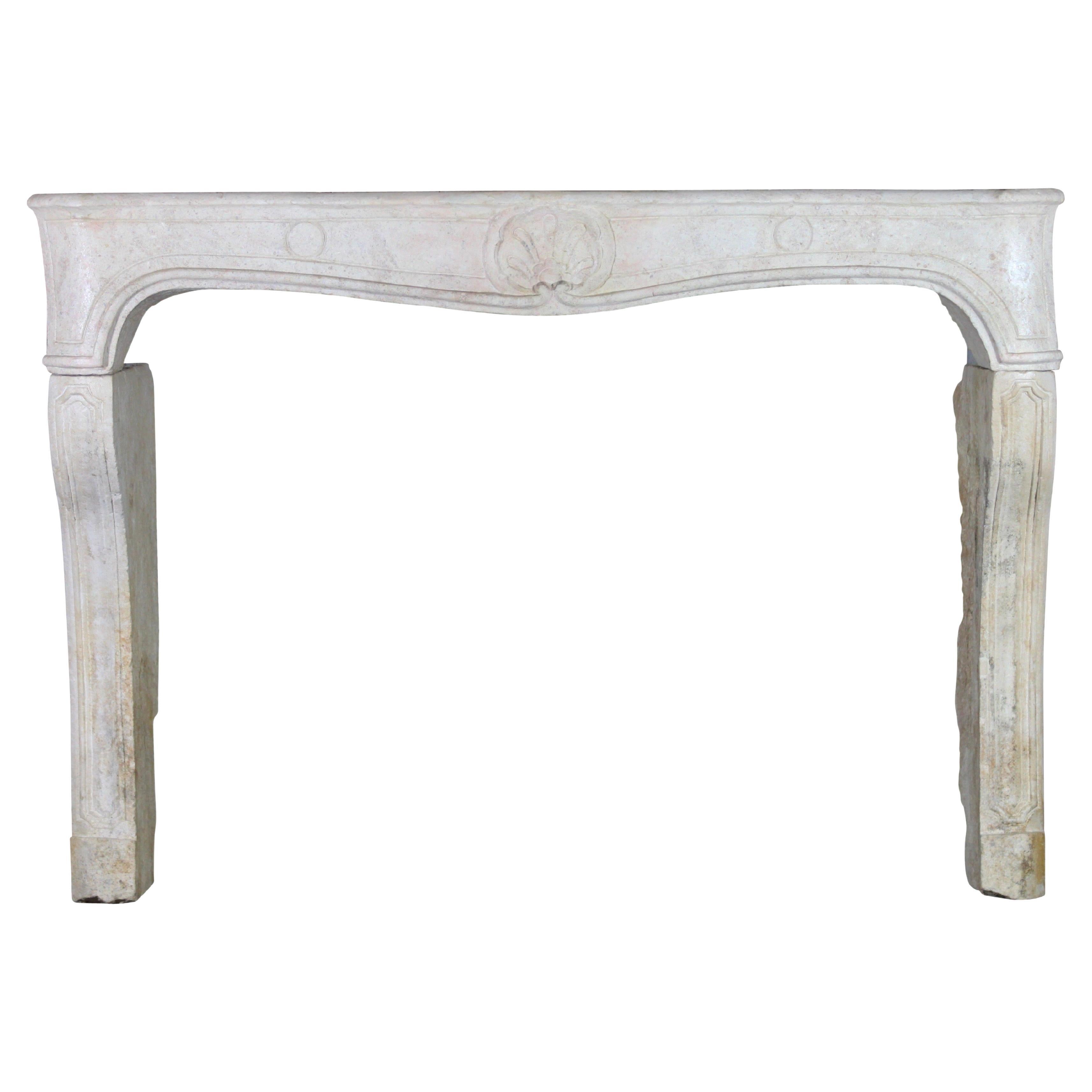 Classic French Louis XV Period Fireplace Surround in Limestone For Sale