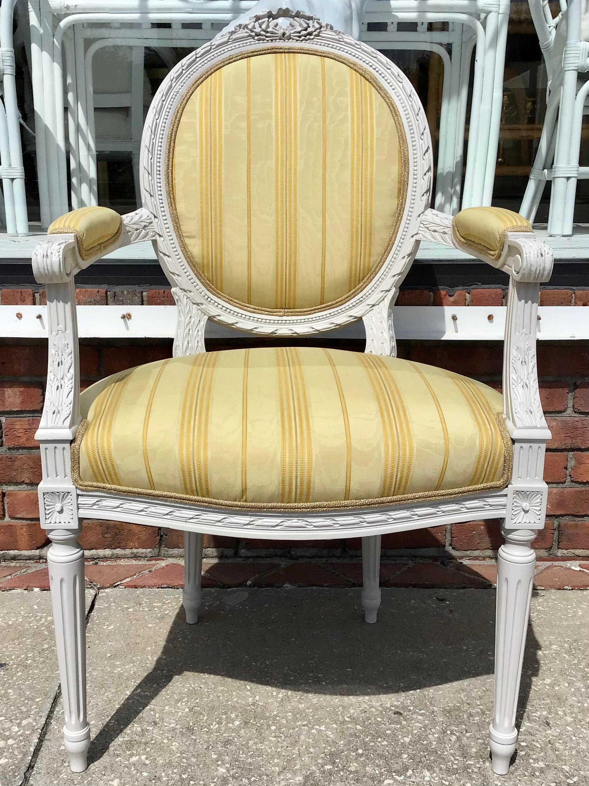 Fabulous 19th century French Louis XVI armchair in new gray lacquer and new todd hase gold stripe upholstery. Add some Classic Style to your Home.