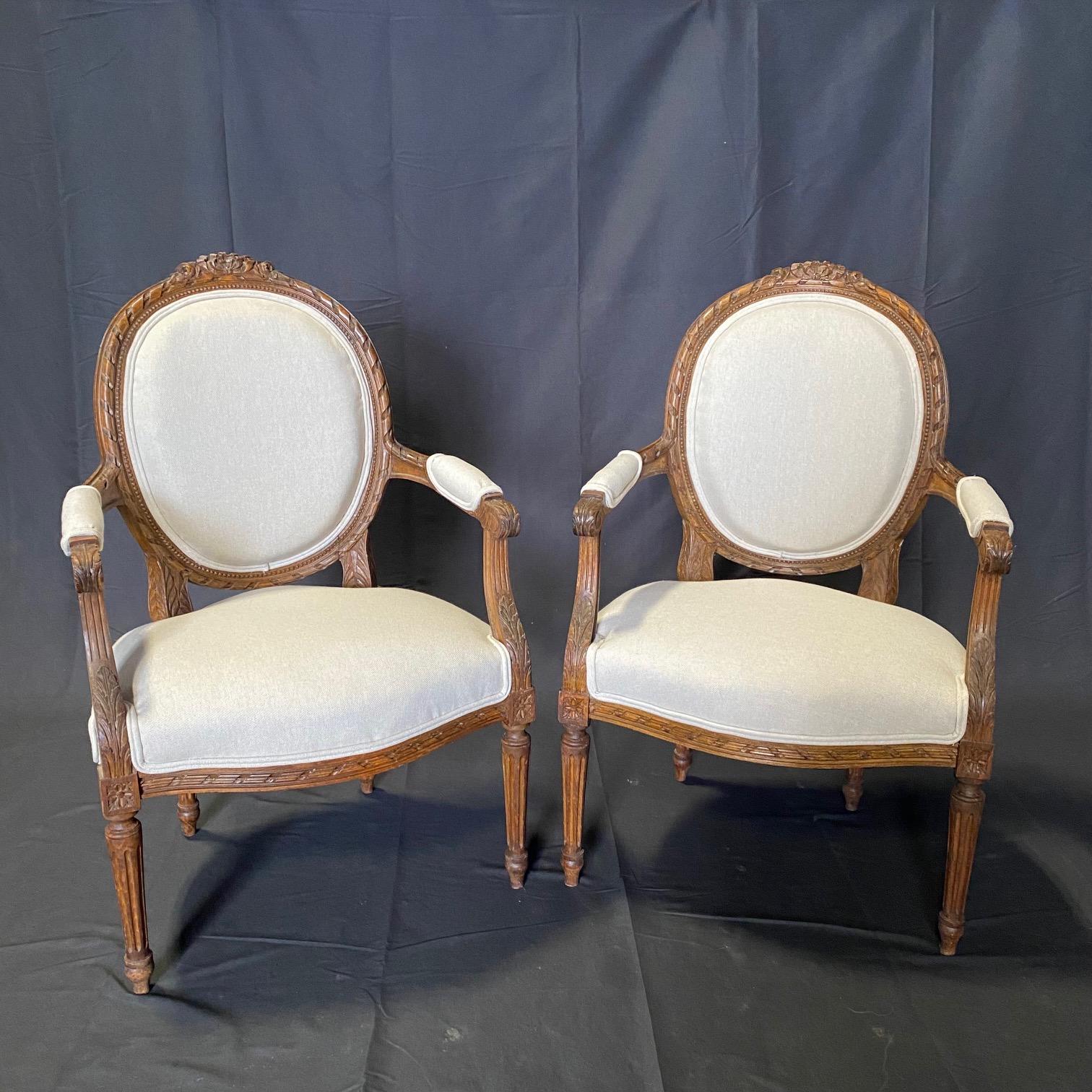 Classic French Pair of Antique Highly Carved Louis XVI Armchairs or Fauteuils  For Sale 6