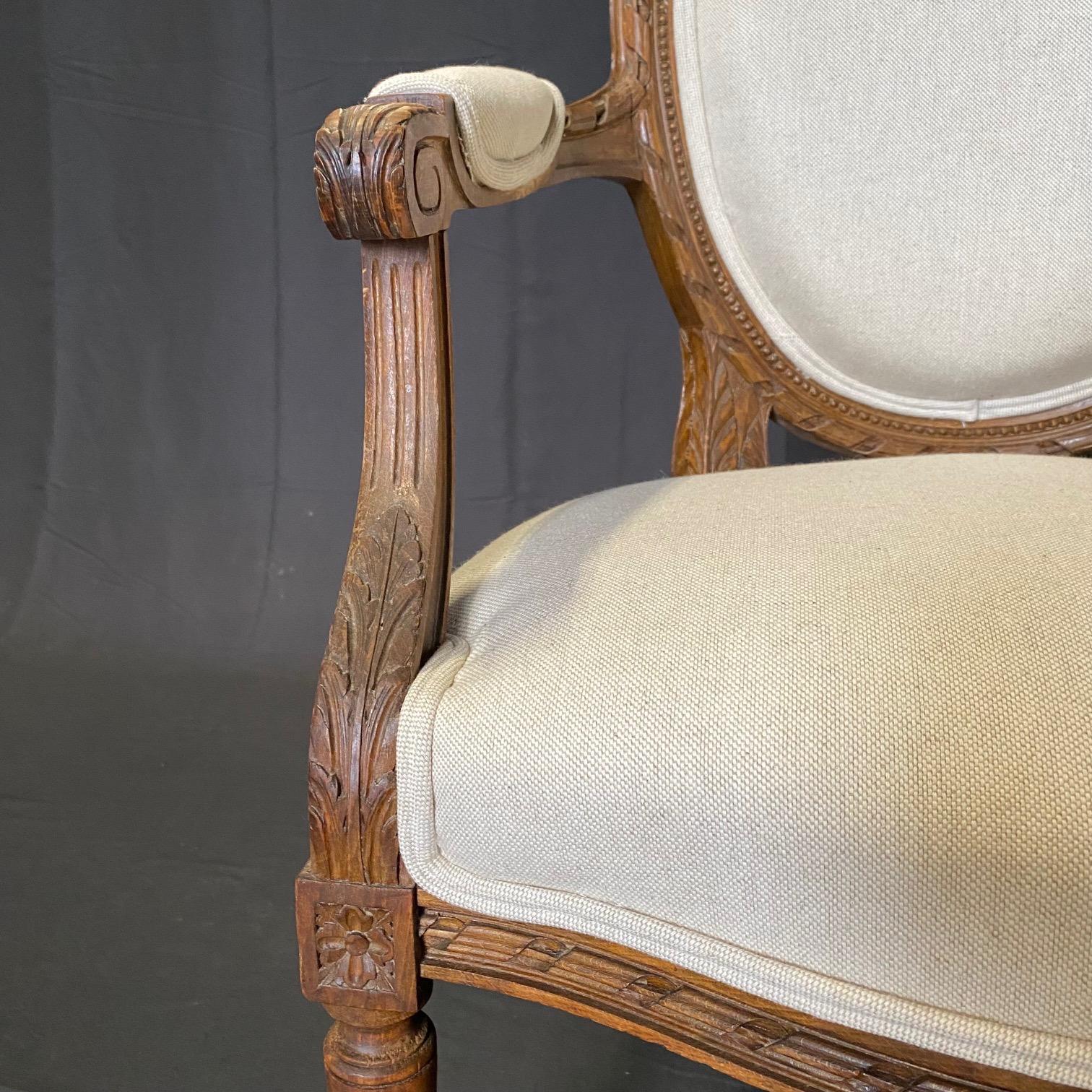 Classic French Pair of Antique Highly Carved Louis XVI Armchairs or Fauteuils  In Good Condition For Sale In Hopewell, NJ