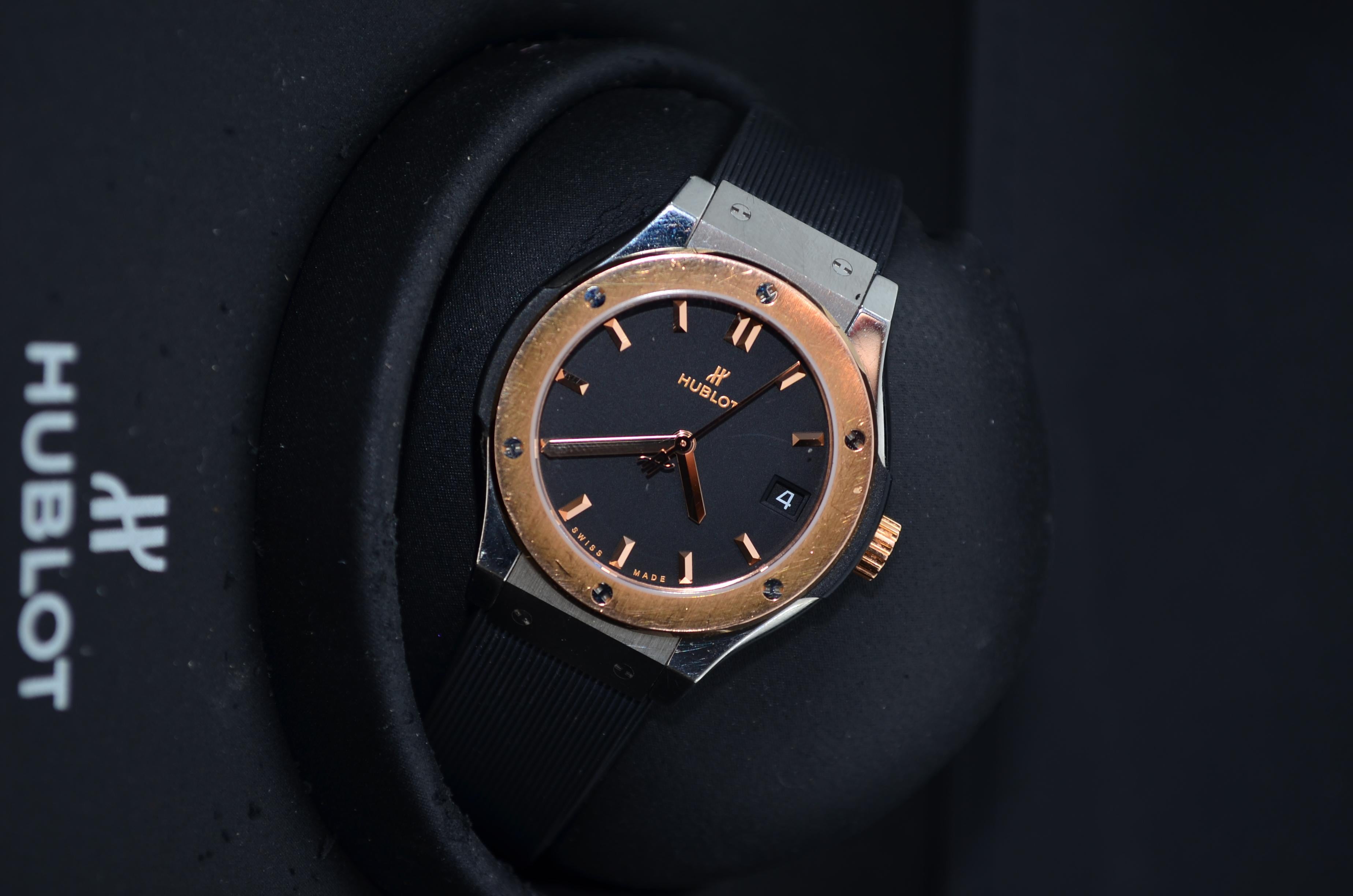 The watch is in a very good condition and it’s working well. It shows slight signs of wear and scratches. The watch comes with the original box and documents, along with an AGS Jewelry warranty card. Hublot was founded in 1980 by Carlo Crocco, an