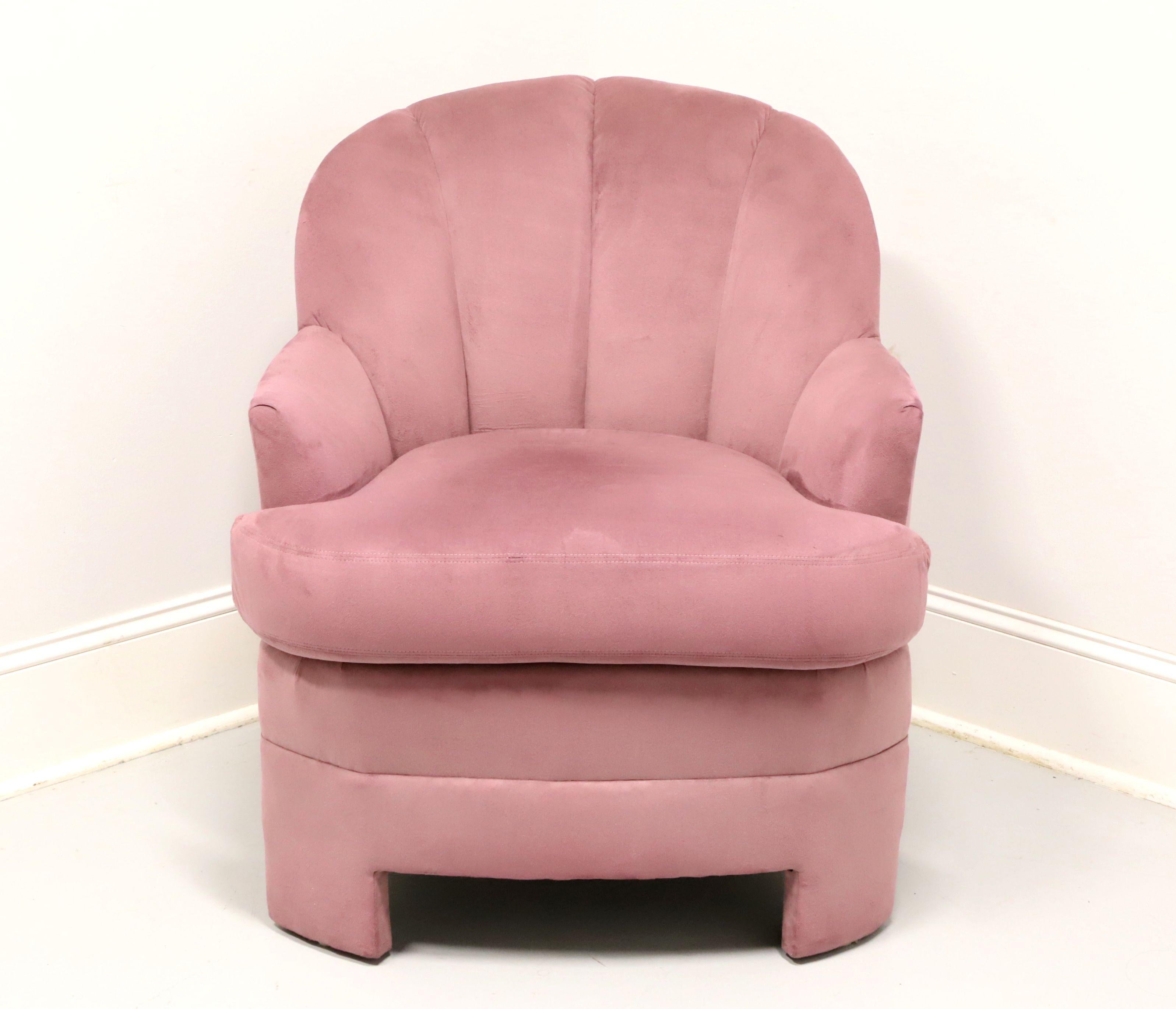 An Art Deco style upholstered club chair by Classic Gallery. Solid wood frame, mauve color velvet fabric upholstery, tufted rounded back, rounded fully upholstered arms, ventilated clip stay seat cushion and fully upholstered base. Made in the USA,