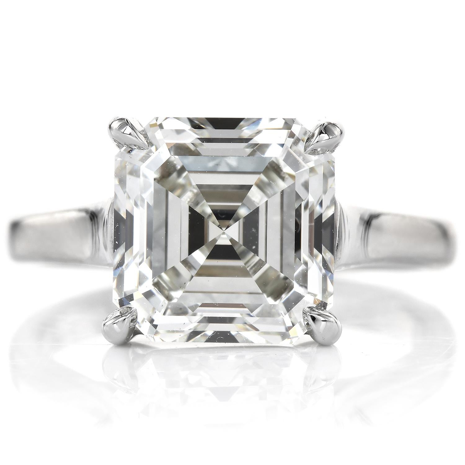 This Breathtaking Square Emerald-cut diamond ring is crafted in solid 14k white gold. It is Centered on a natural diamond, weighing approx 5.49 carats K-VS2 Color with Excellent proportion secured in four prongs. This conspicuous engagement ring