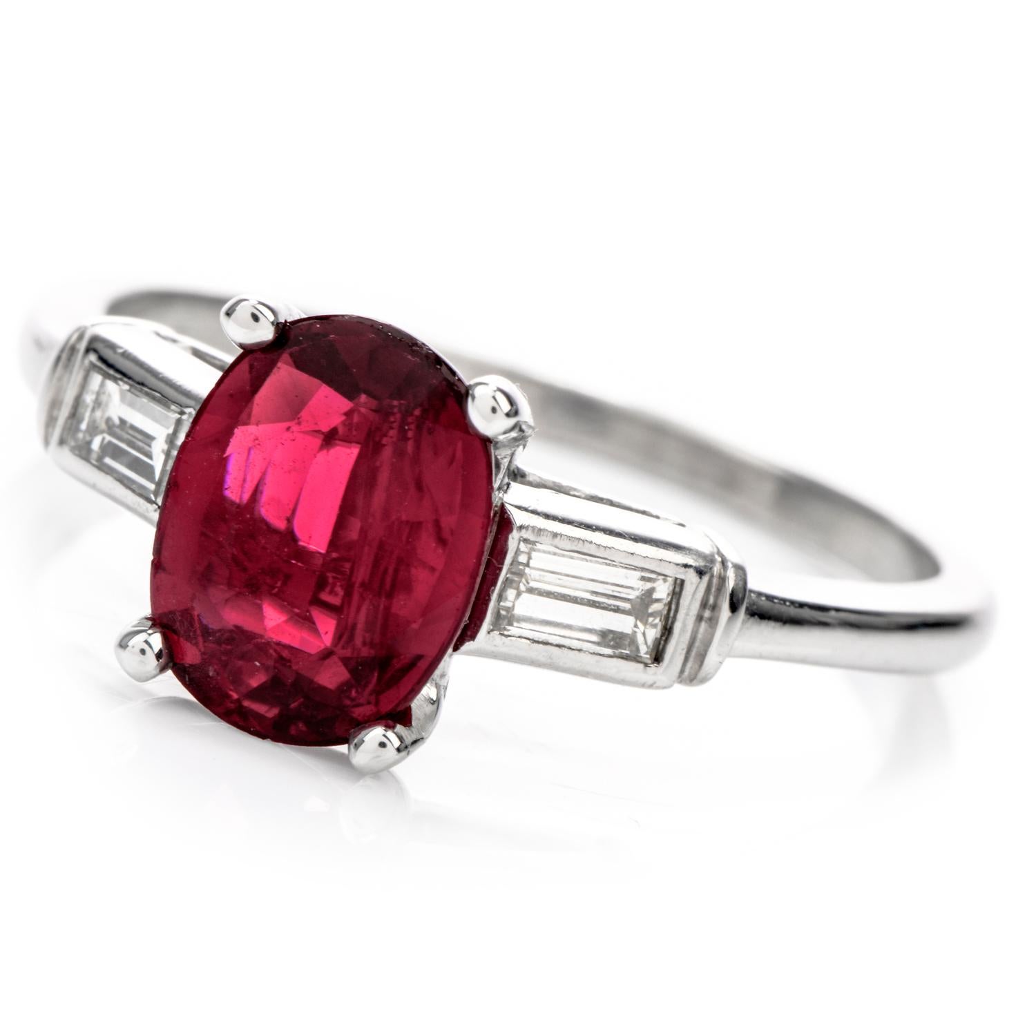 This brightly colored Engagement ring was inspired in a 3 stone design and crafted in Platinum.

Adorning the center is a transparent GIA certified vibrant Red Ruby weighing approx. 1.80 carats, Thailand origin, measuring 9.01 x 6.59 x