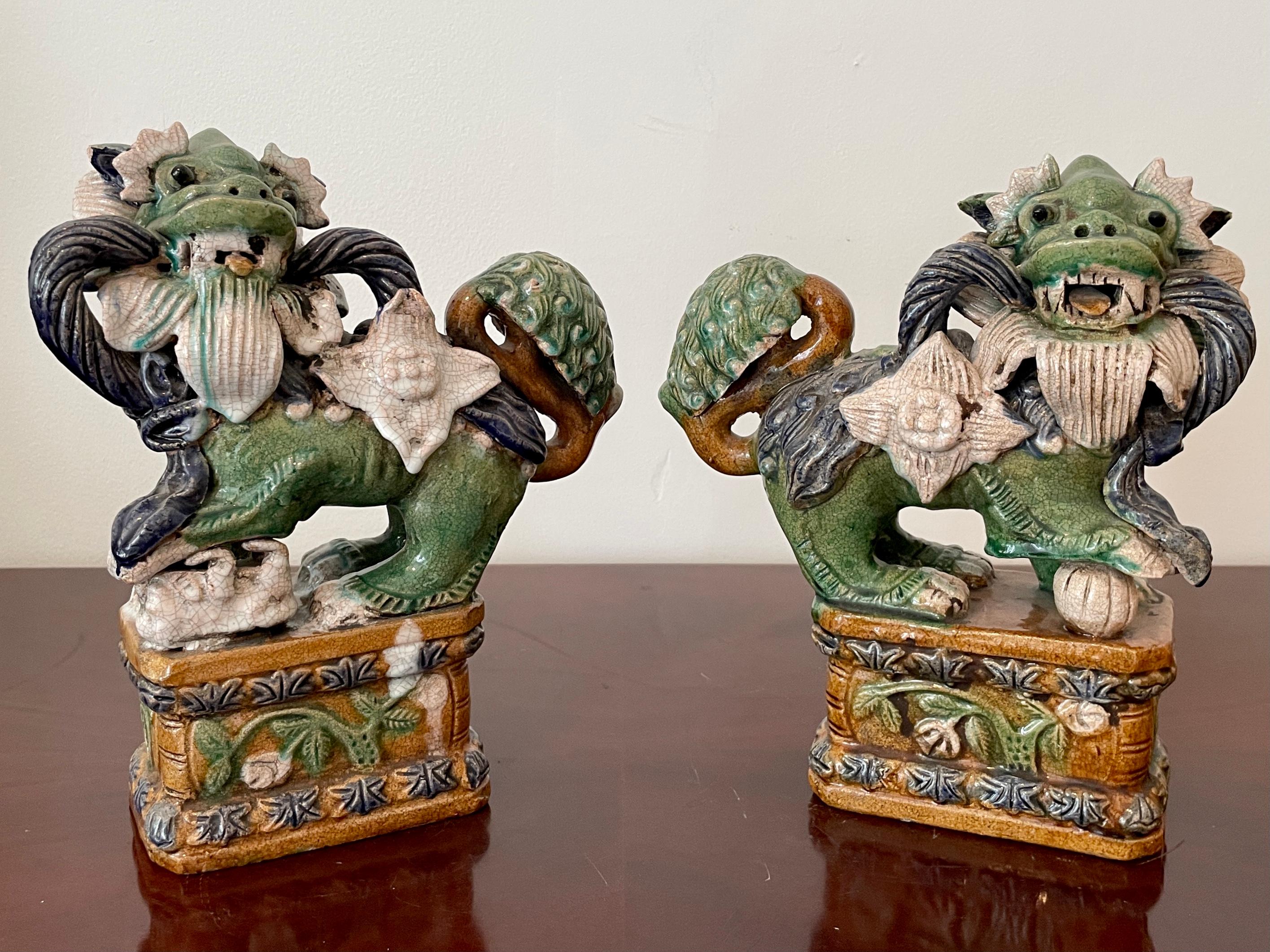 Terracotta Classic Glazed Terra Cotta Foo Dogs on a Base, a Pair For Sale