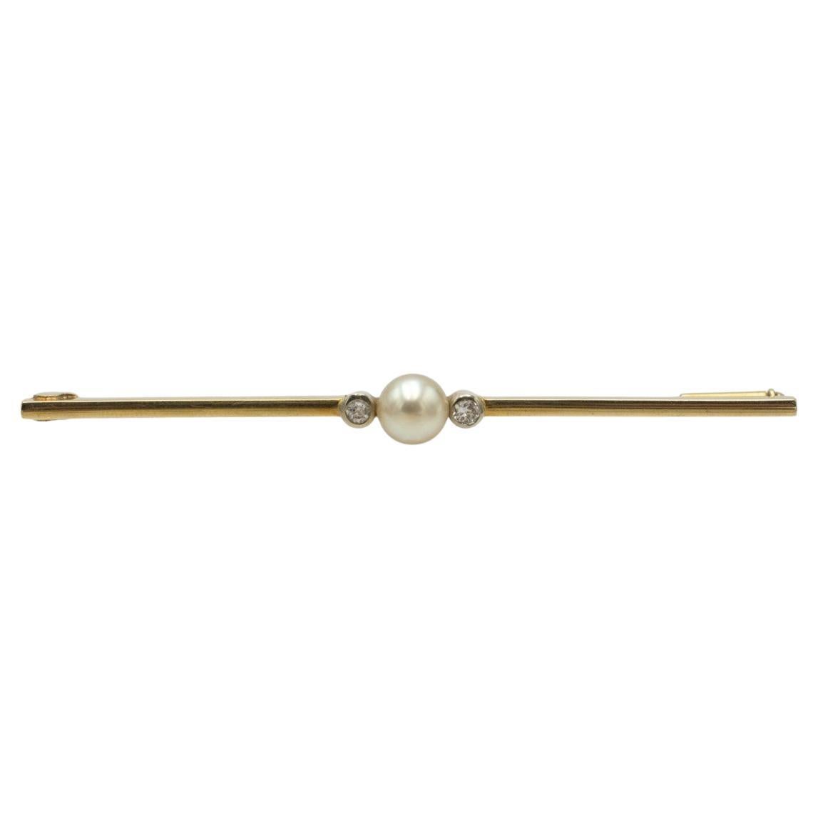 Classic gold brooch with a cultured pearl and diamonds, circa 1925