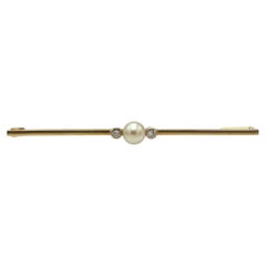 Classic gold brooch with a cultured pearl and diamonds, circa 1925