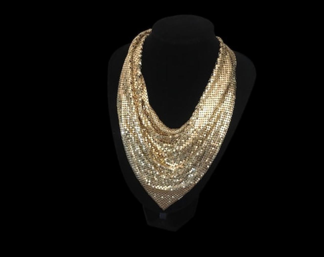 Vintage 1960’s gold chain mail bib necklace by designer whiting and Davis in very good condition looks unworn
designer necklace 
Era 1960’s
9 “L x 2” W x 16“ H 
With makers tag
hook closure that is adjustable to fit several sizes.
Known for