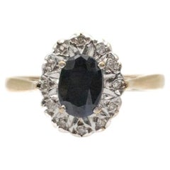Classic gold ring with a natural sapphire and diamonds, Great Britain