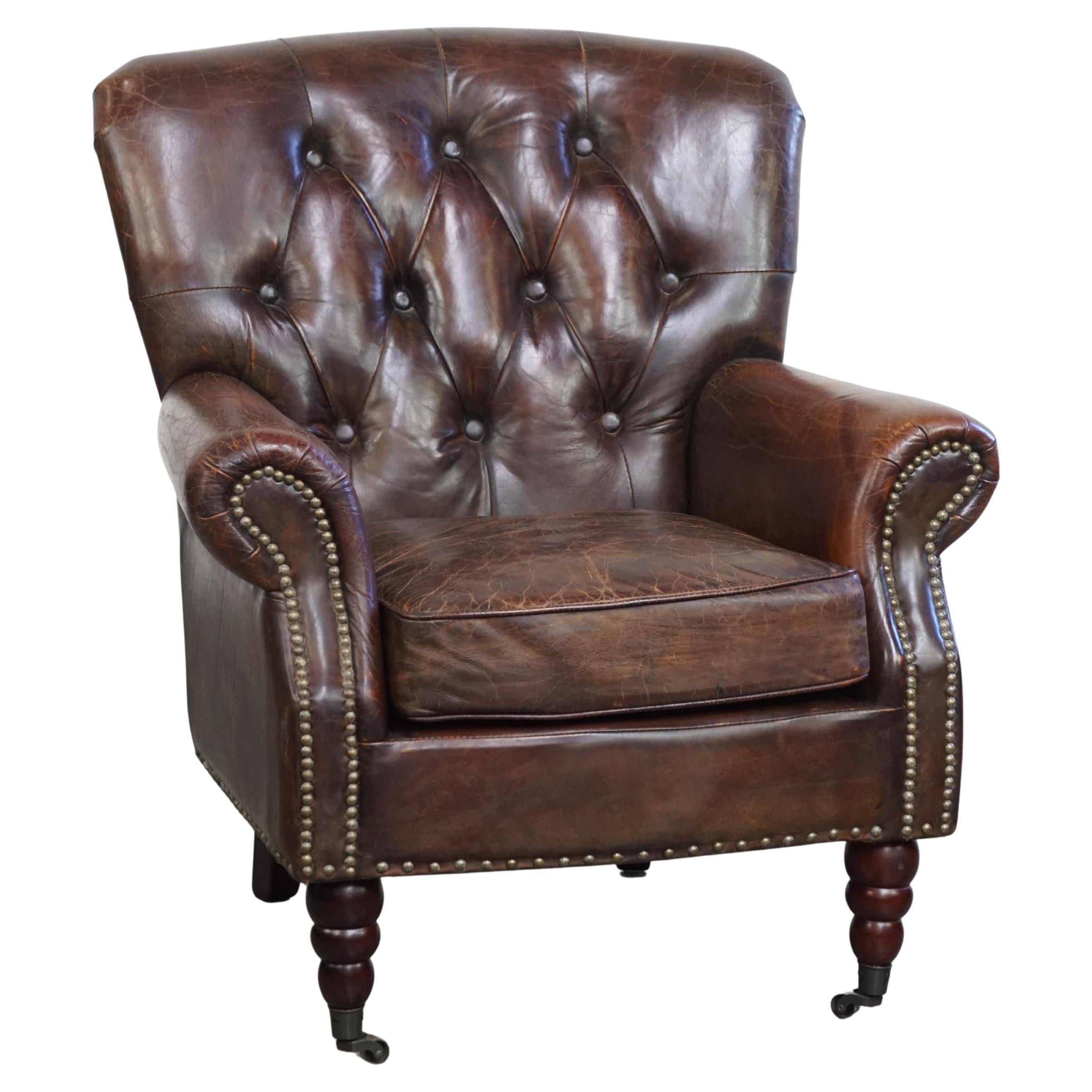 Classic grained cognac colored cowhide leather Chesterfield armchair