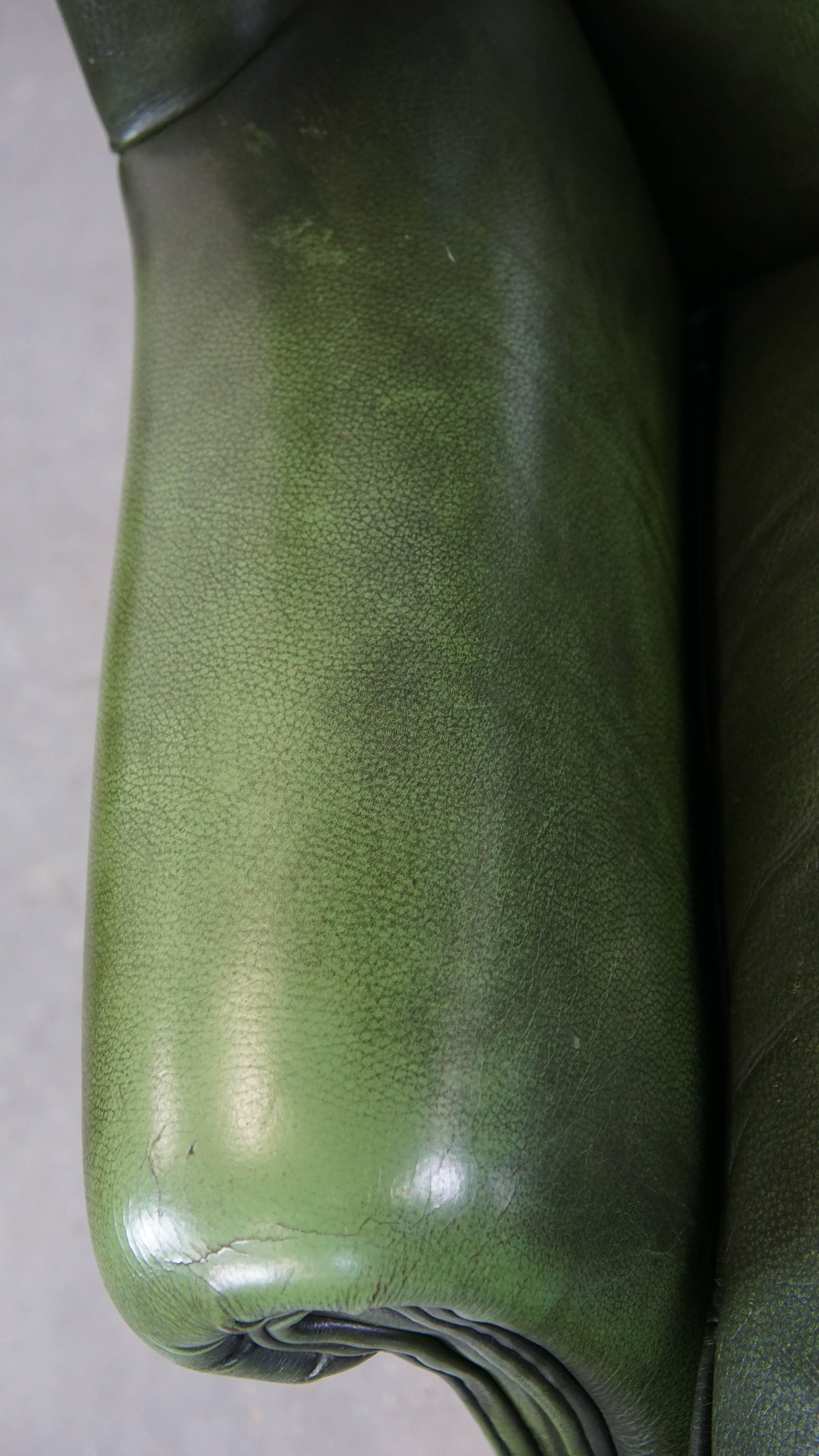 Classic green cowhide English Chesterfield wing chair with a comfortable seat For Sale 1