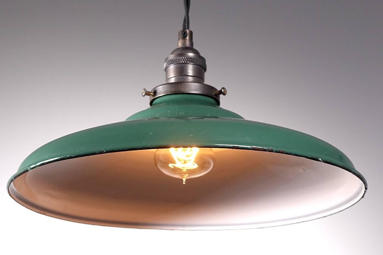 When you think Industrial lighting this is the look most envision first. Its the Classic green over white porcelain finished pressed steel shade. Add an antique filament bulb and the look is perfect. The lamps are priced per so you can buy only one