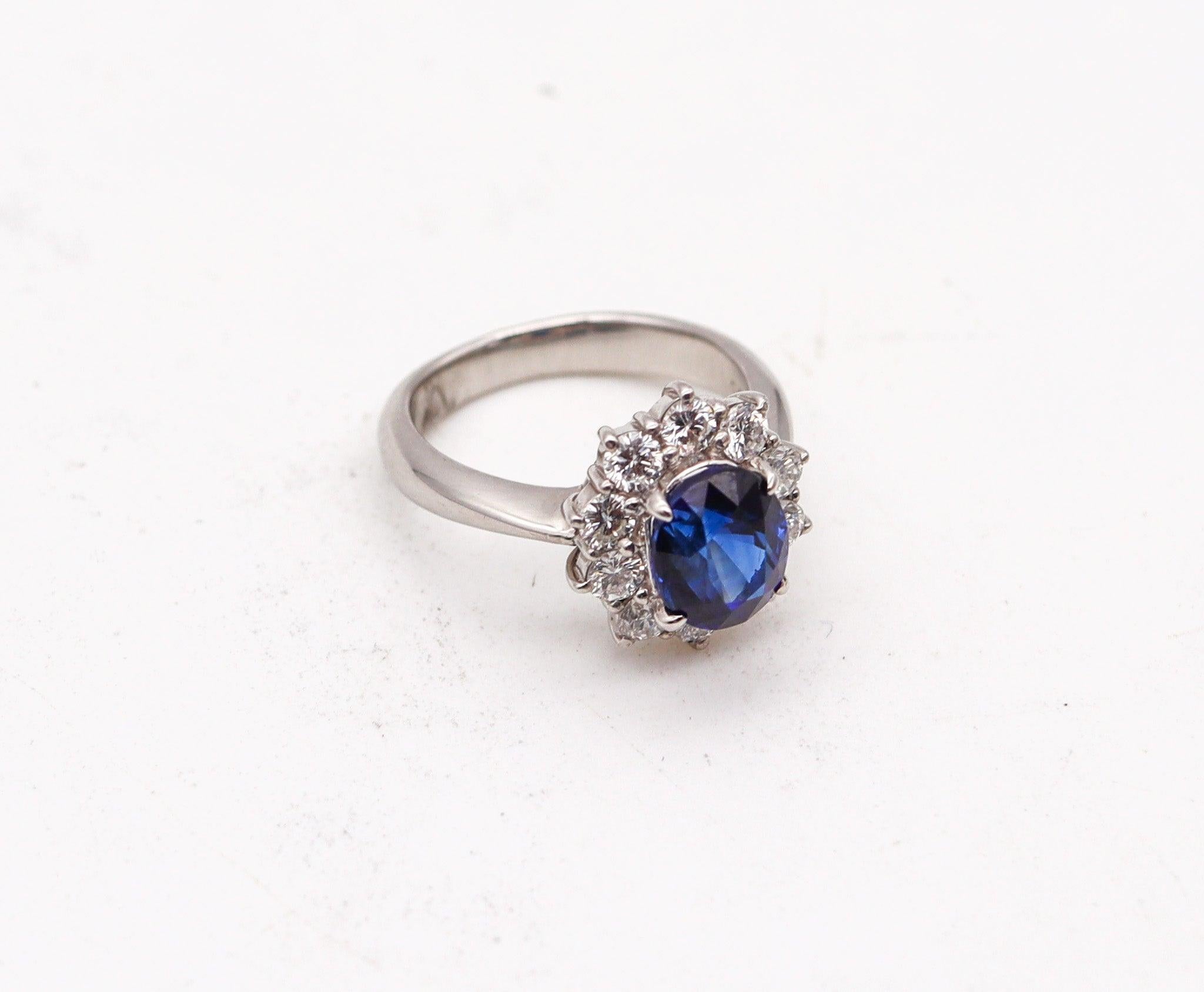 Modernist CLASSIC Halo Ring In Platinum With 3.14 Ctw In Sapphires And Diamonds For Sale