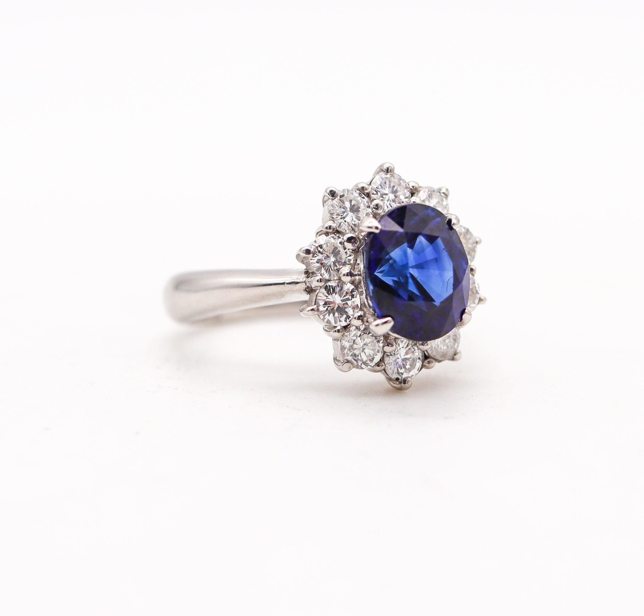 Oval Cut CLASSIC Halo Ring In Platinum With 3.14 Ctw In Sapphires And Diamonds For Sale