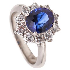CLASSIC Halo-Ring aus Platin mit 3,14 Karat Saphiren und Diamanten